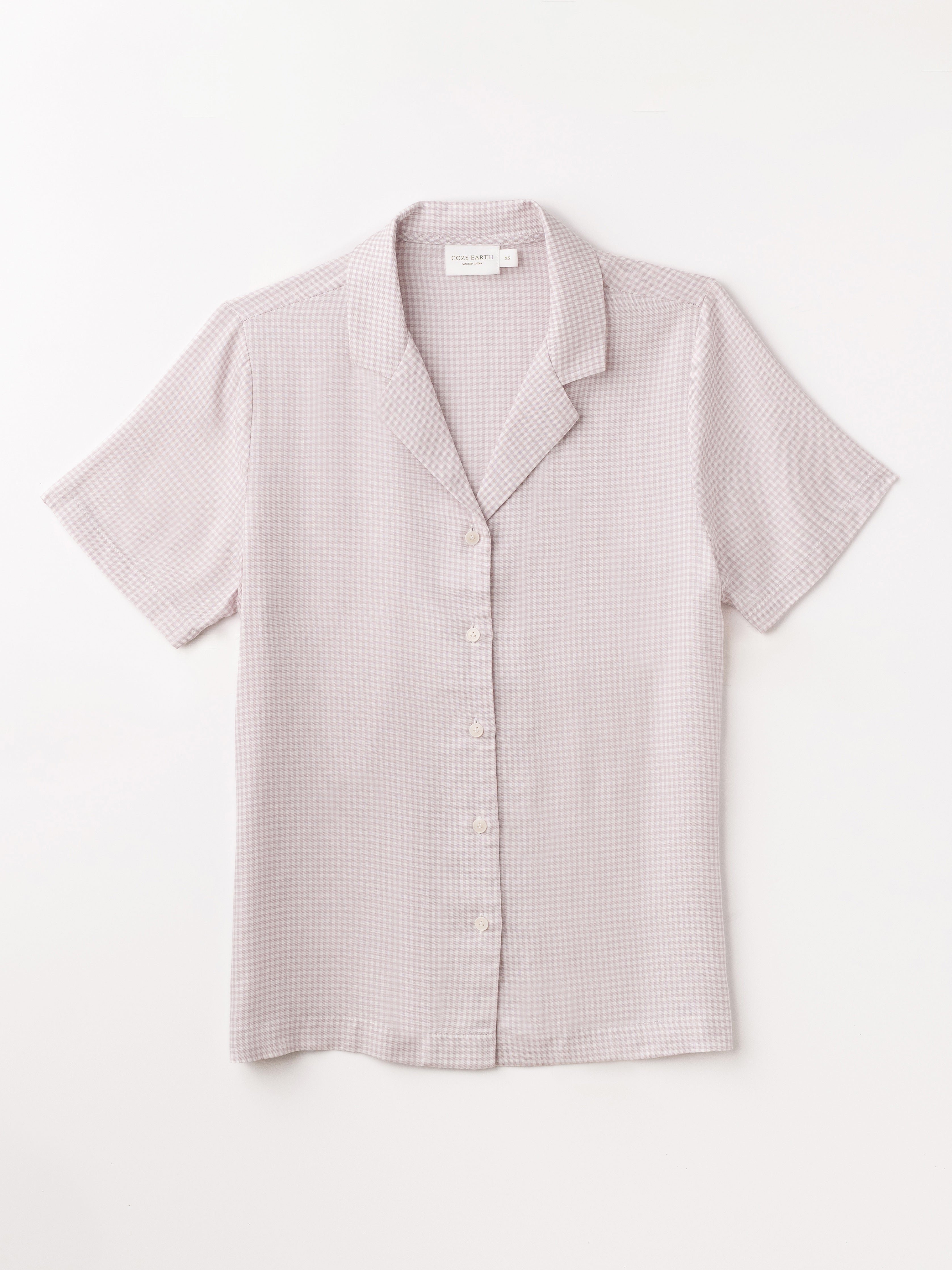 Flat lay of lavender mini gingham pajama top with white background 