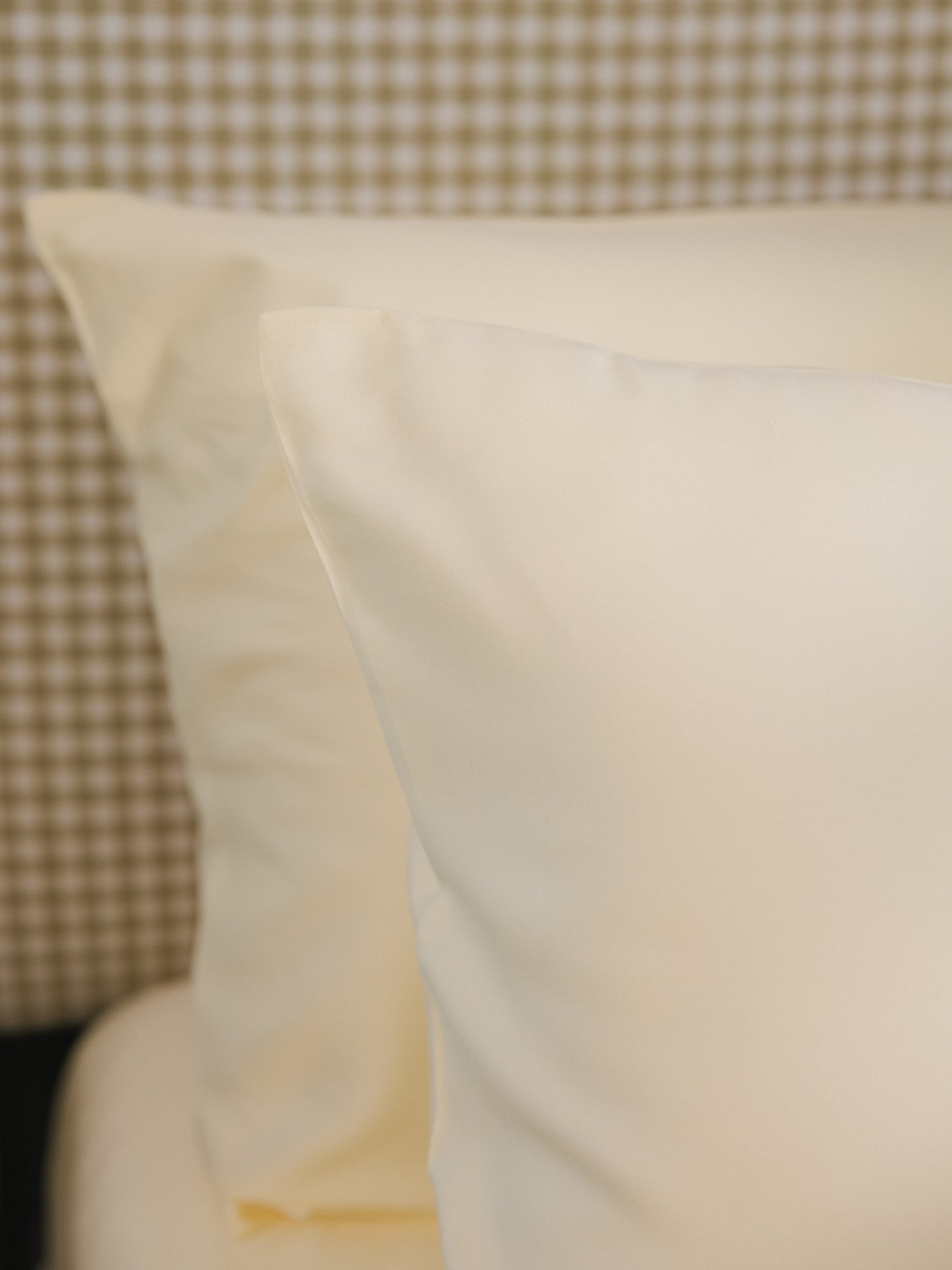 Lemonade Pillowcases on bed standard/king. 