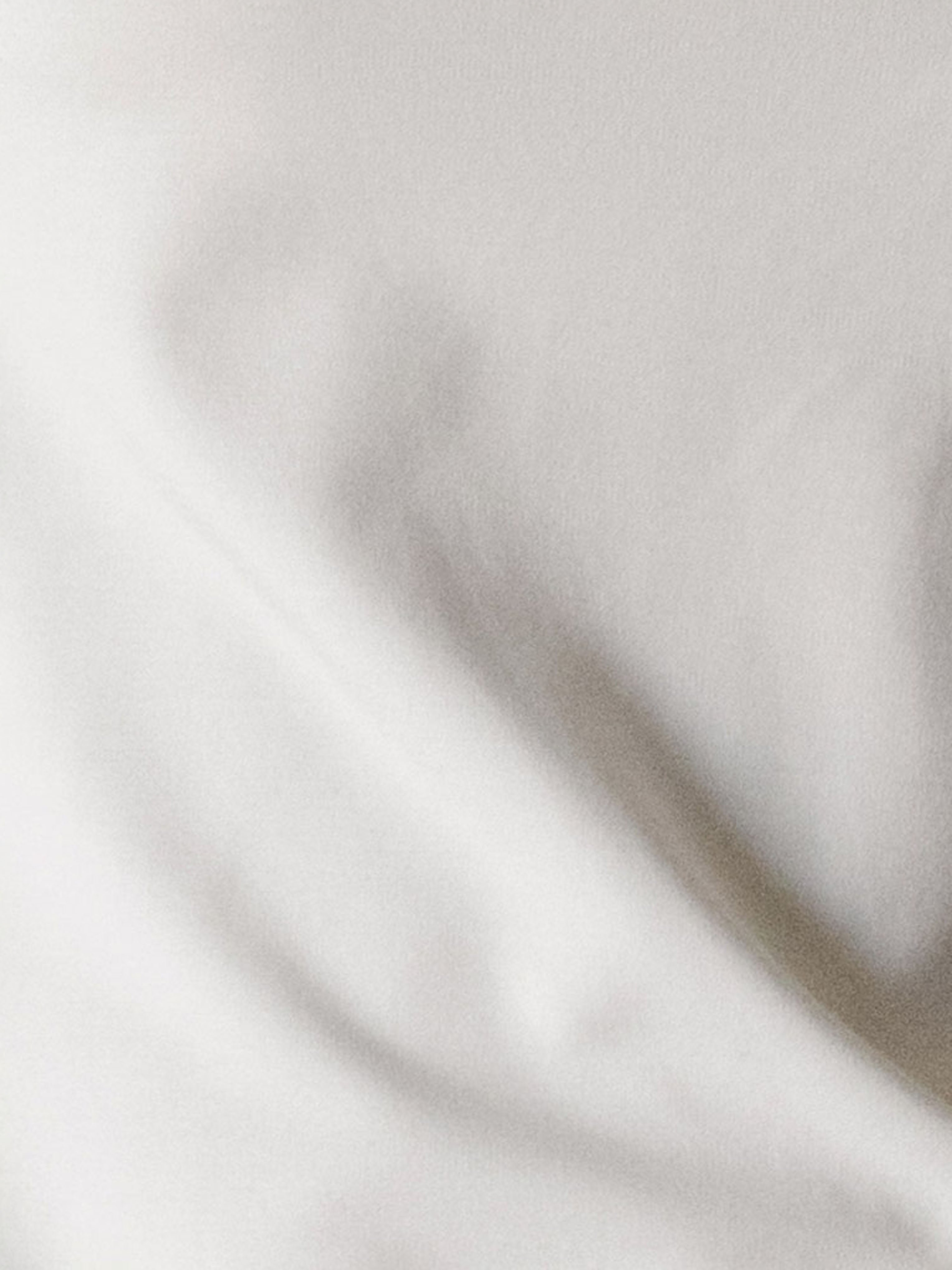 Light Grey Men's Bamboo Jogger Set. Photo taken close to the material so that the texture can be seen.