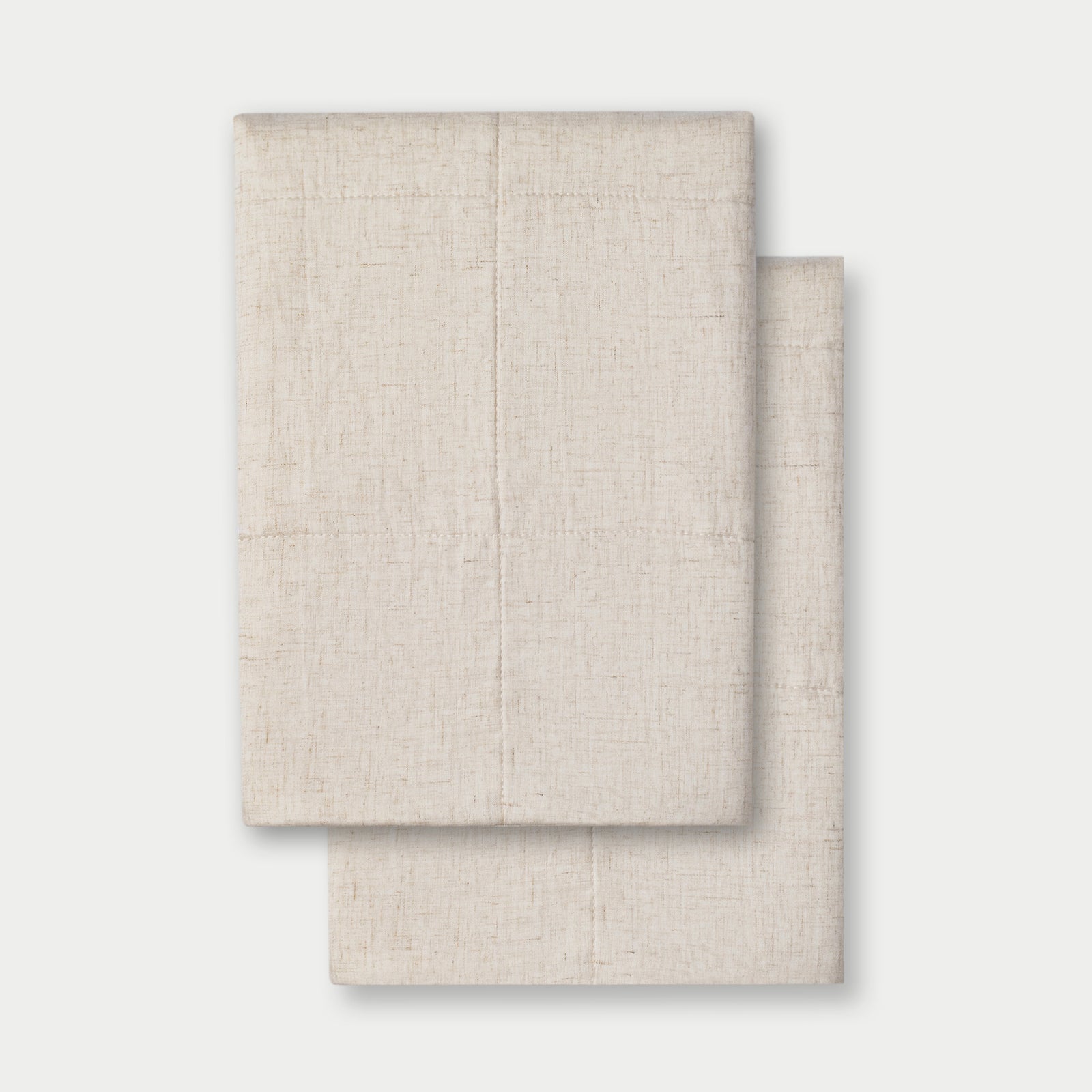 Natural Linen Box Quilt Sham neatly folded over white background. 