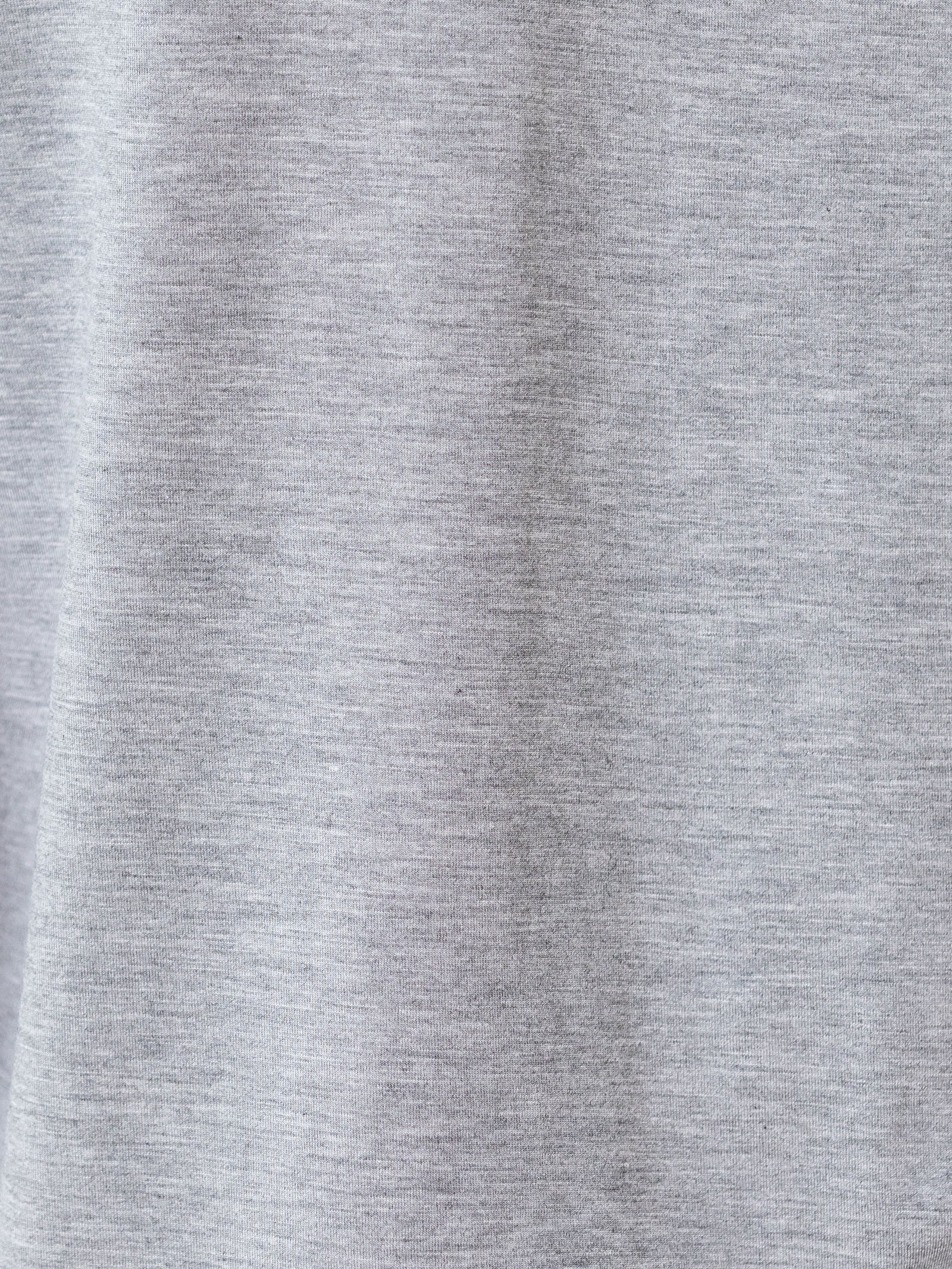 Grey Long Sleeve Pajama Set. The photo was taken close up, showing off the print of the pajamas. 