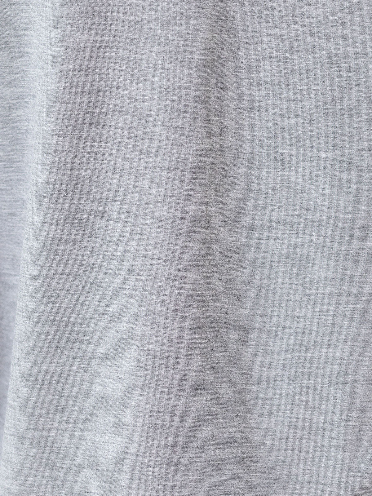 Grey Long Sleeve Pajama Set. The photo was taken close up, showing off the print of the pajamas. 