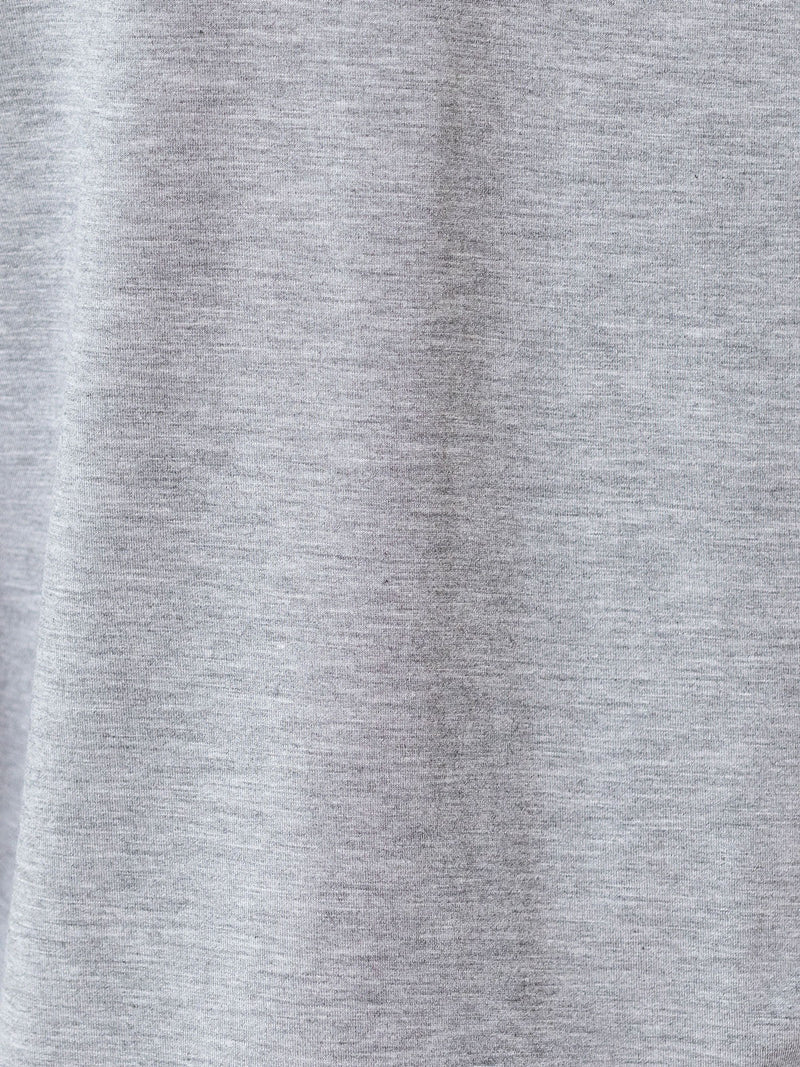 Grey Long Sleeve Pajama Set. The photo was taken close up, showing off the print of the pajamas.