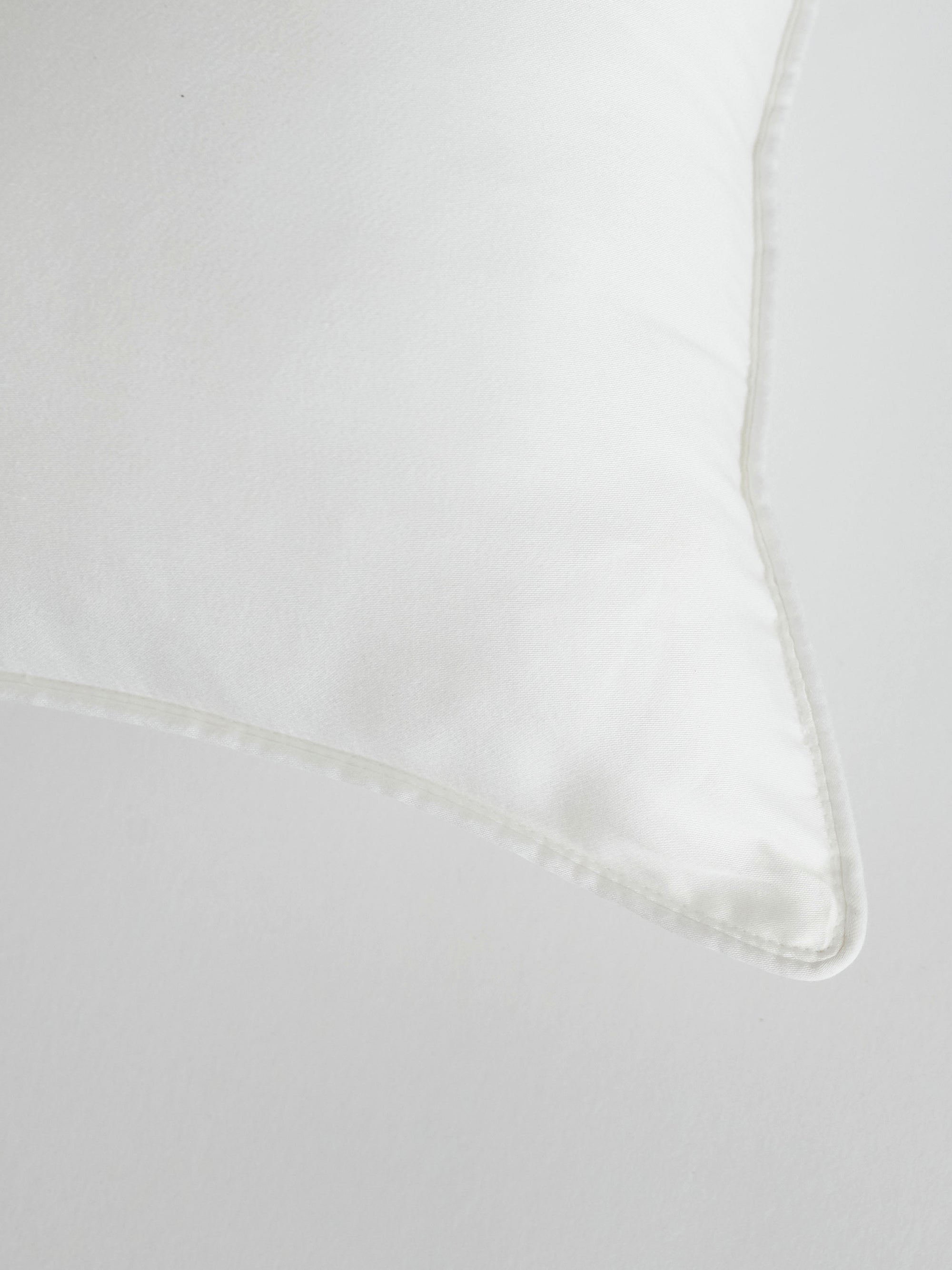 Travel pillow corner with white background 