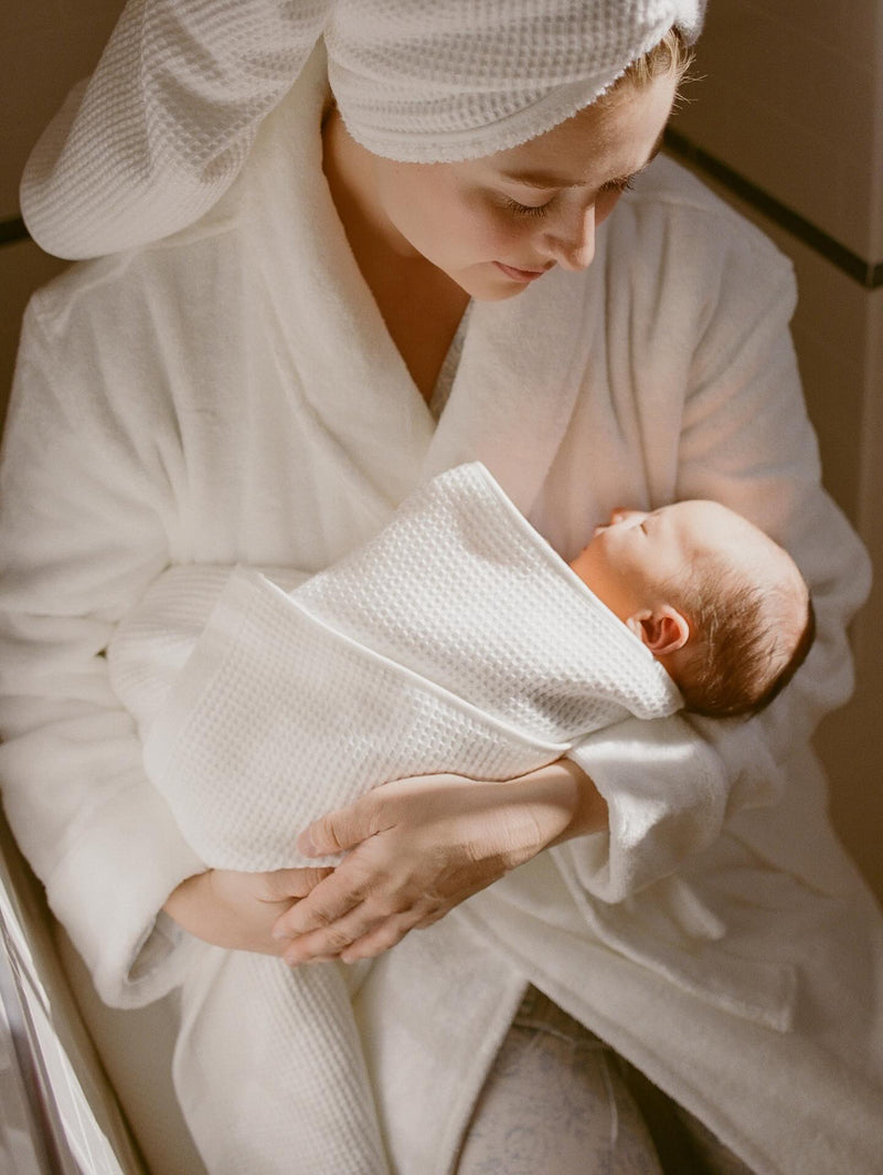 Post-bath, wrapped in Cozy Earth. Because the best moments start with what you wrap them in.