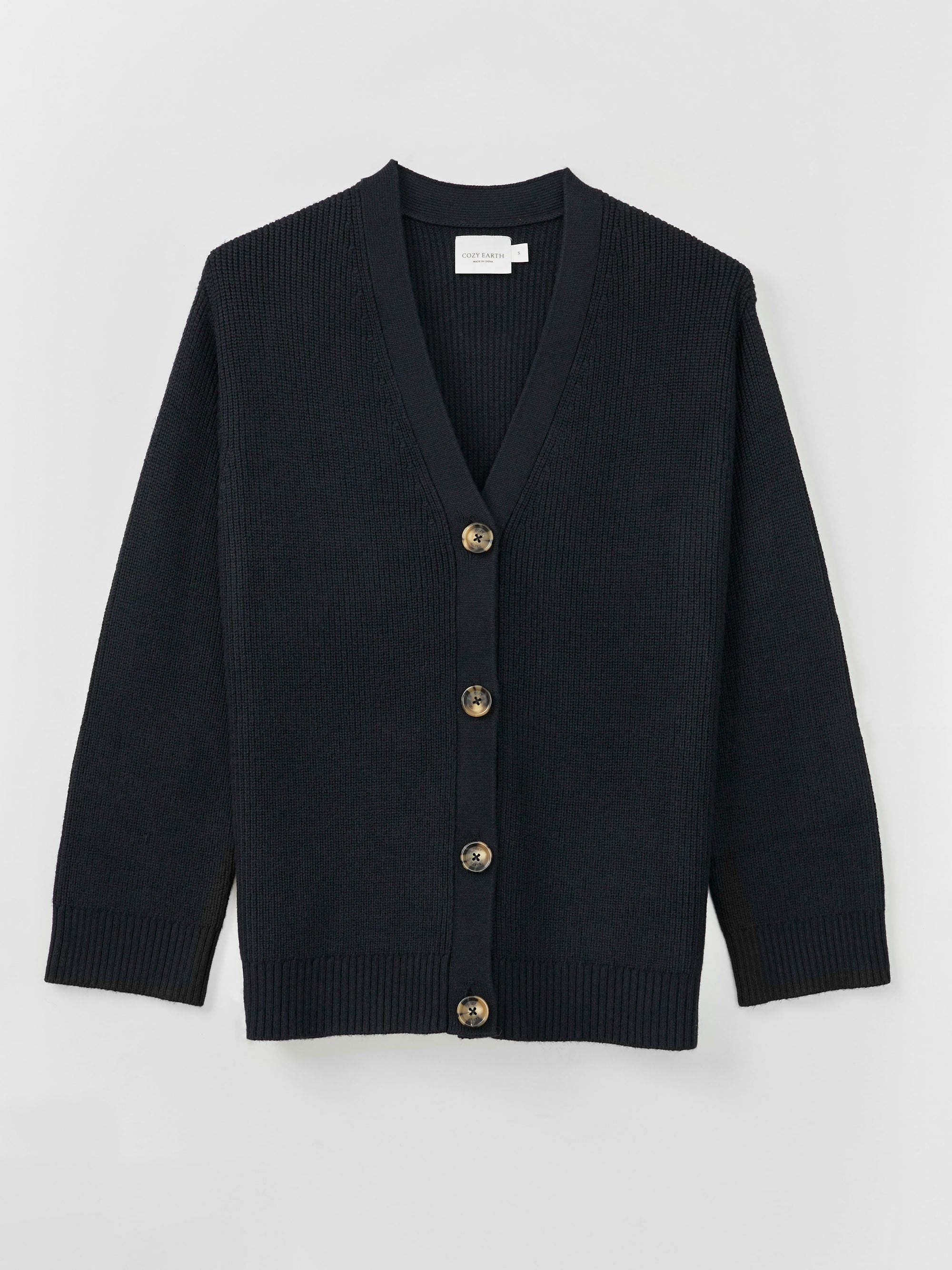 A Cozy Earth Classic Cardigan in Black lies on a white background 