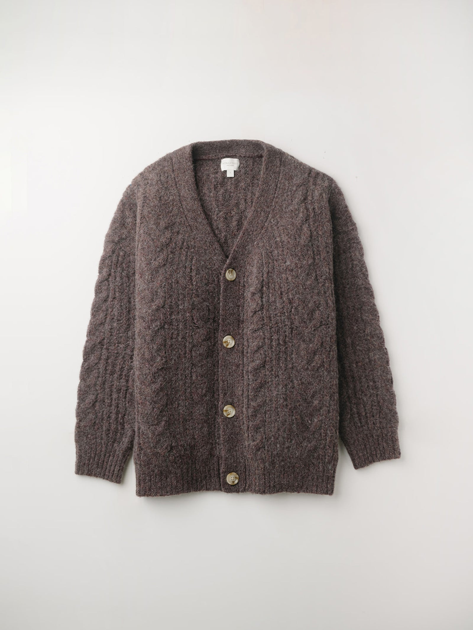 Flat lay of bordeauc cable knit cardigan with white background 