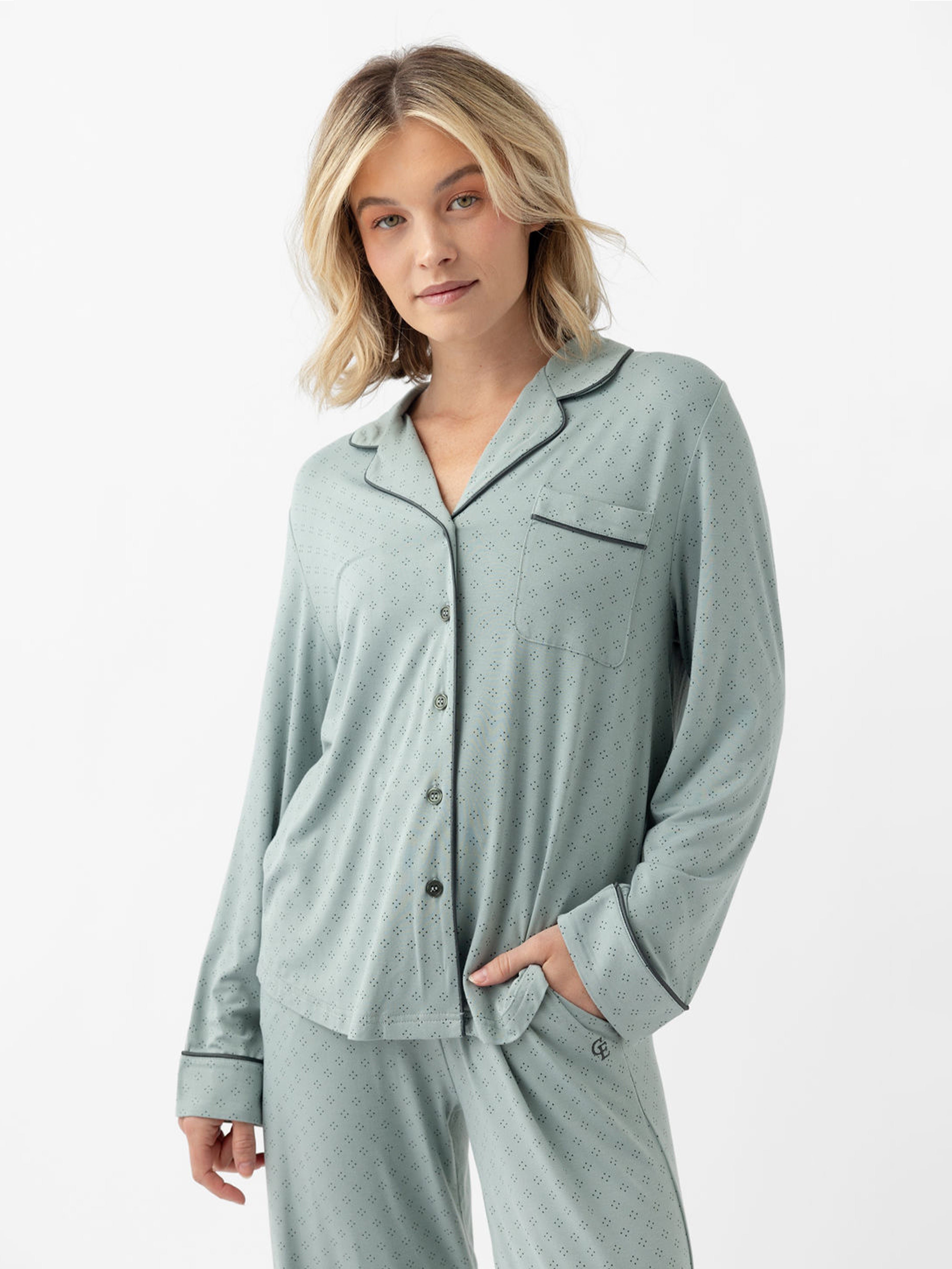 Woman wearing haze diamond dot pajama top with white background 