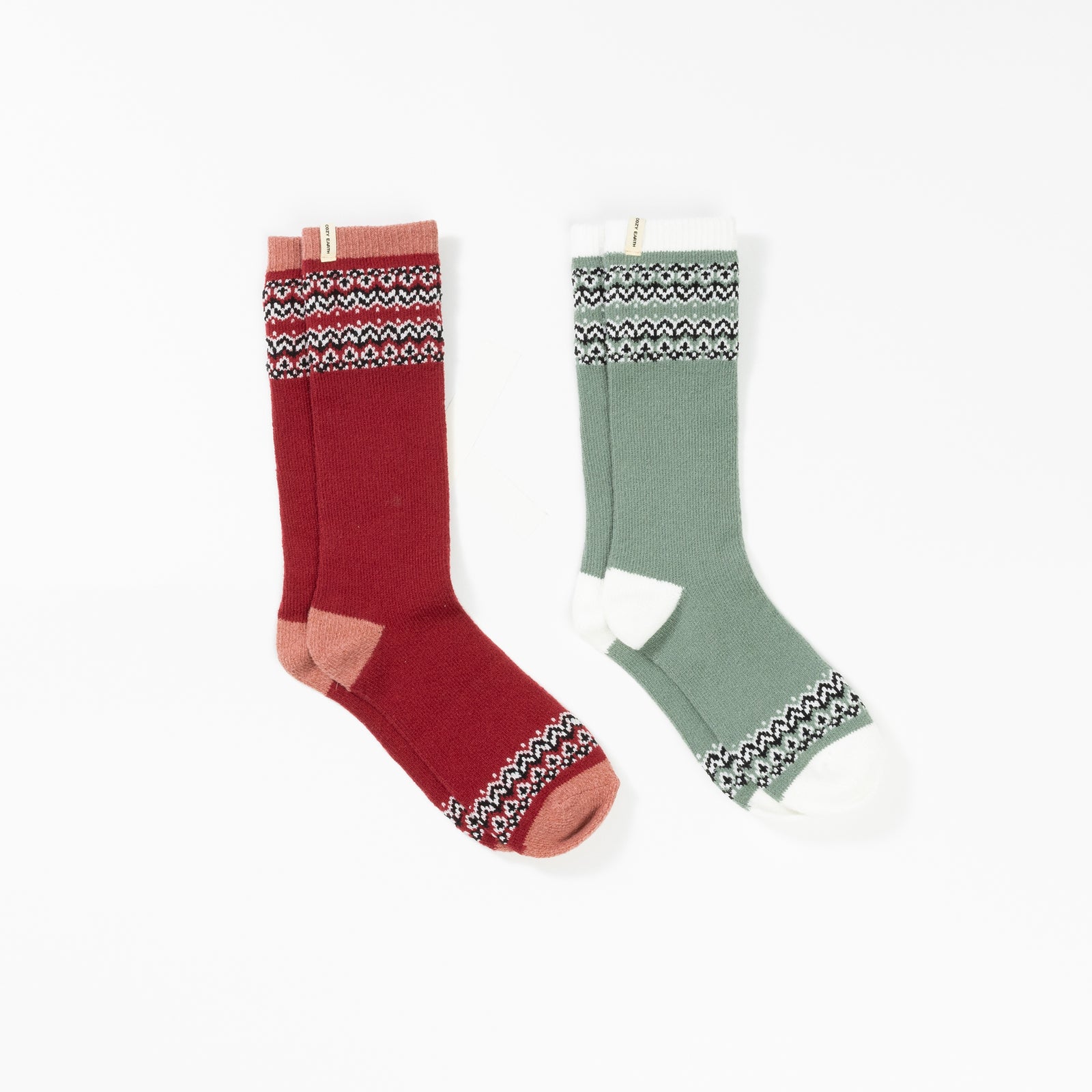 A pair of Fair Isle Plush Lounge Socks in Oakmoss and Garnet pictured against a white background. 