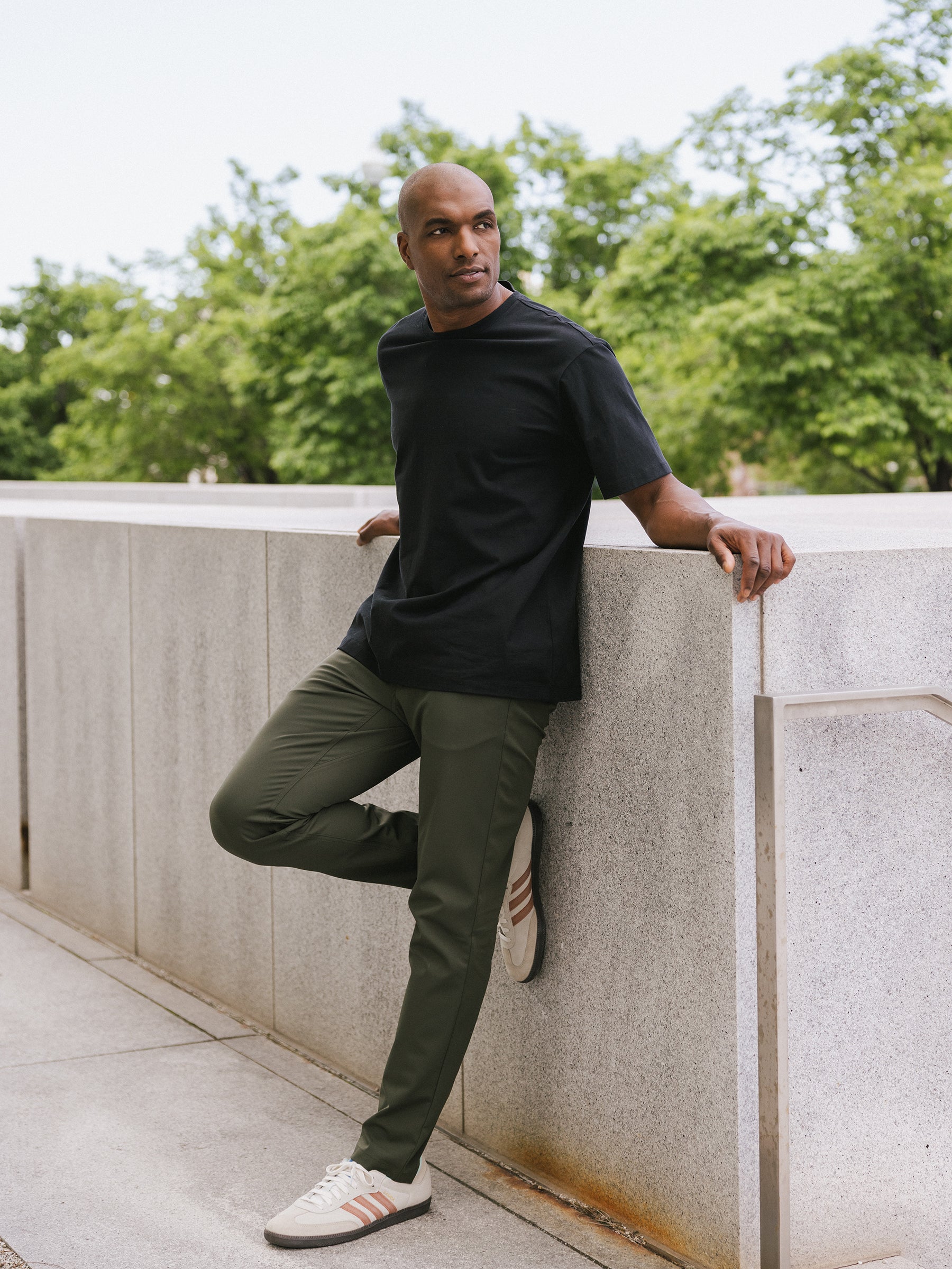 Black shirt olive green pants on sale