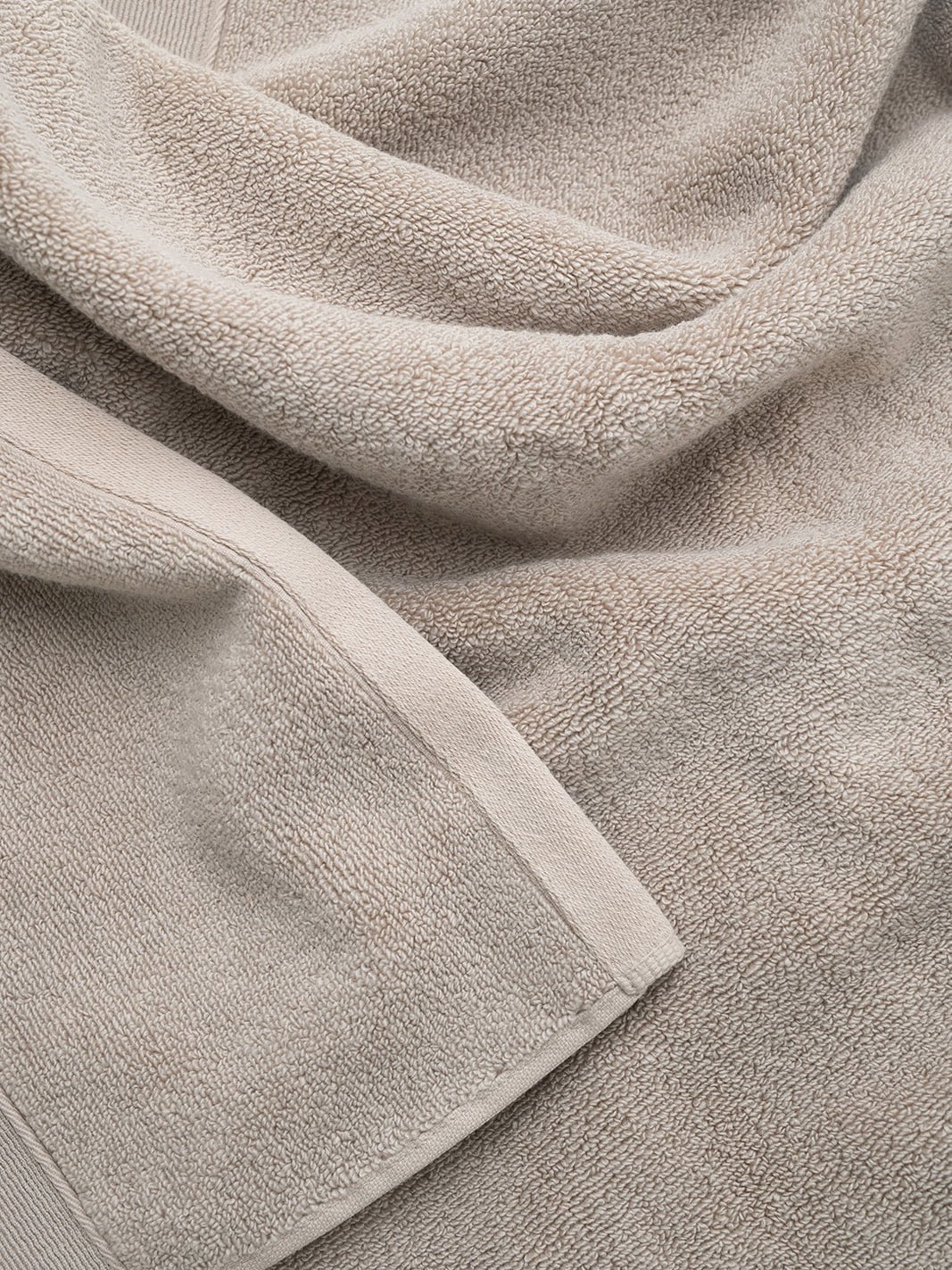 Close up of sand luxe bath sheet 
