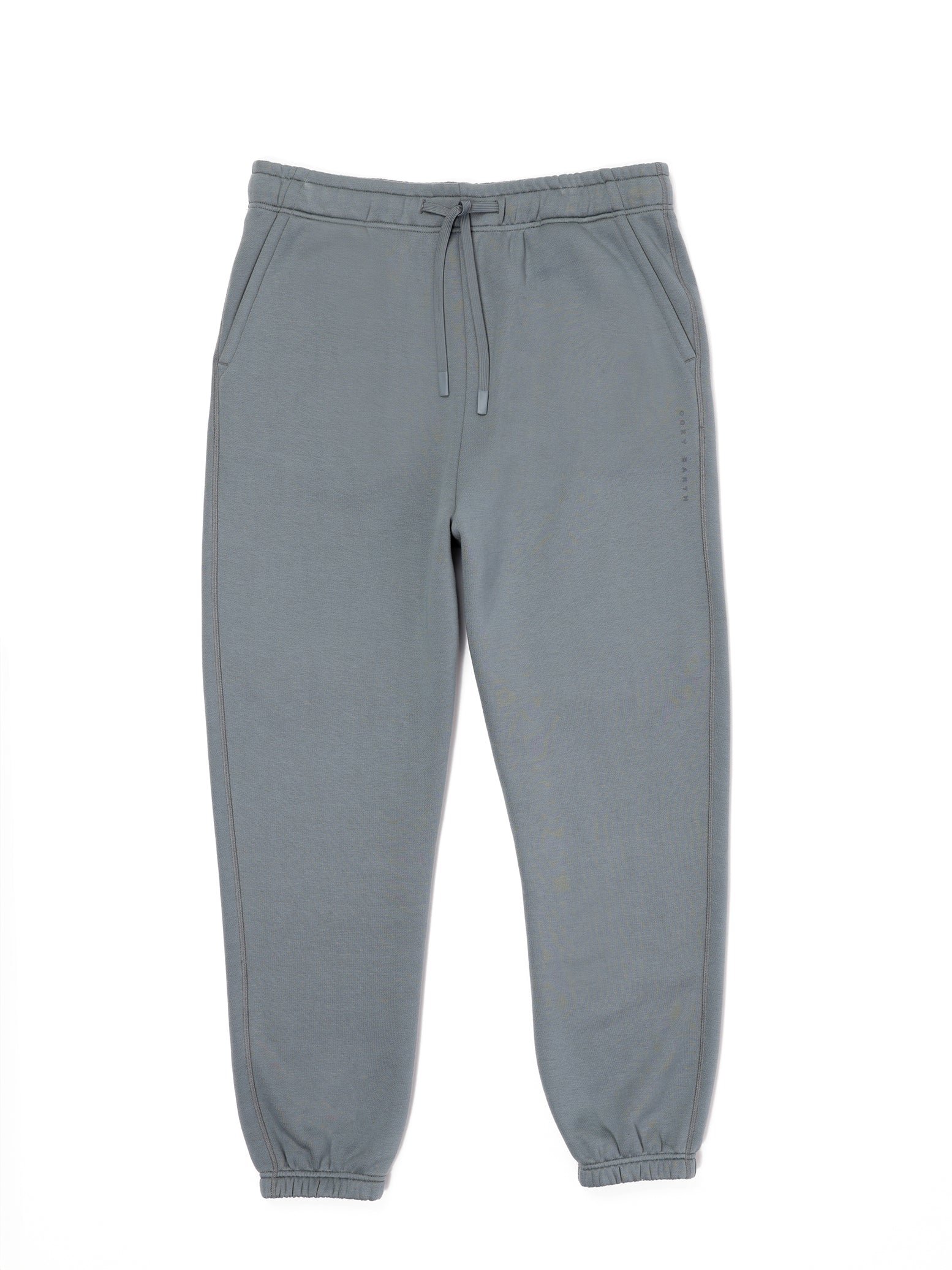Flat lay of smokey blue cityscape sweats with white background 