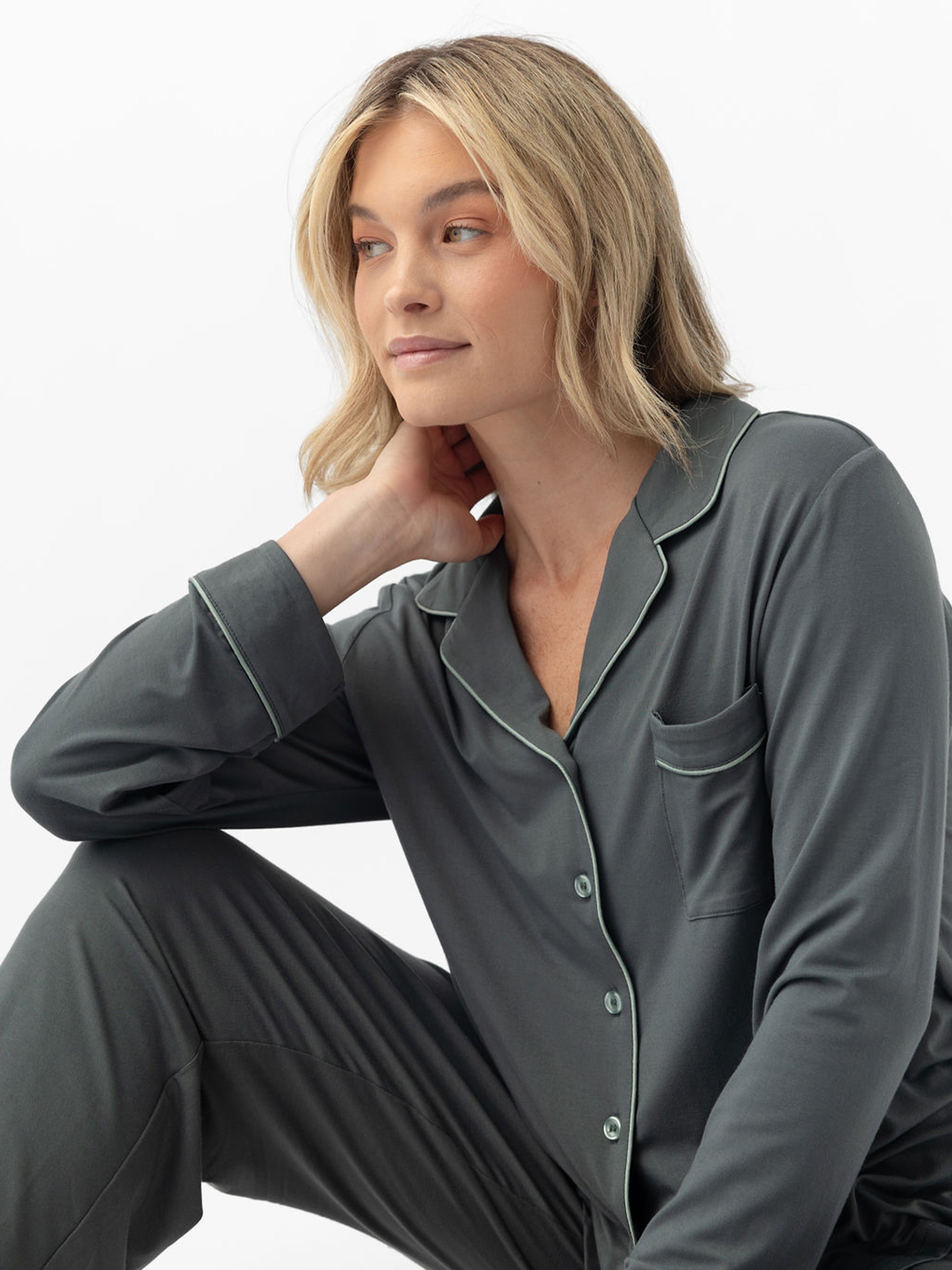 Woman sitting on ground in storm pajama set 
