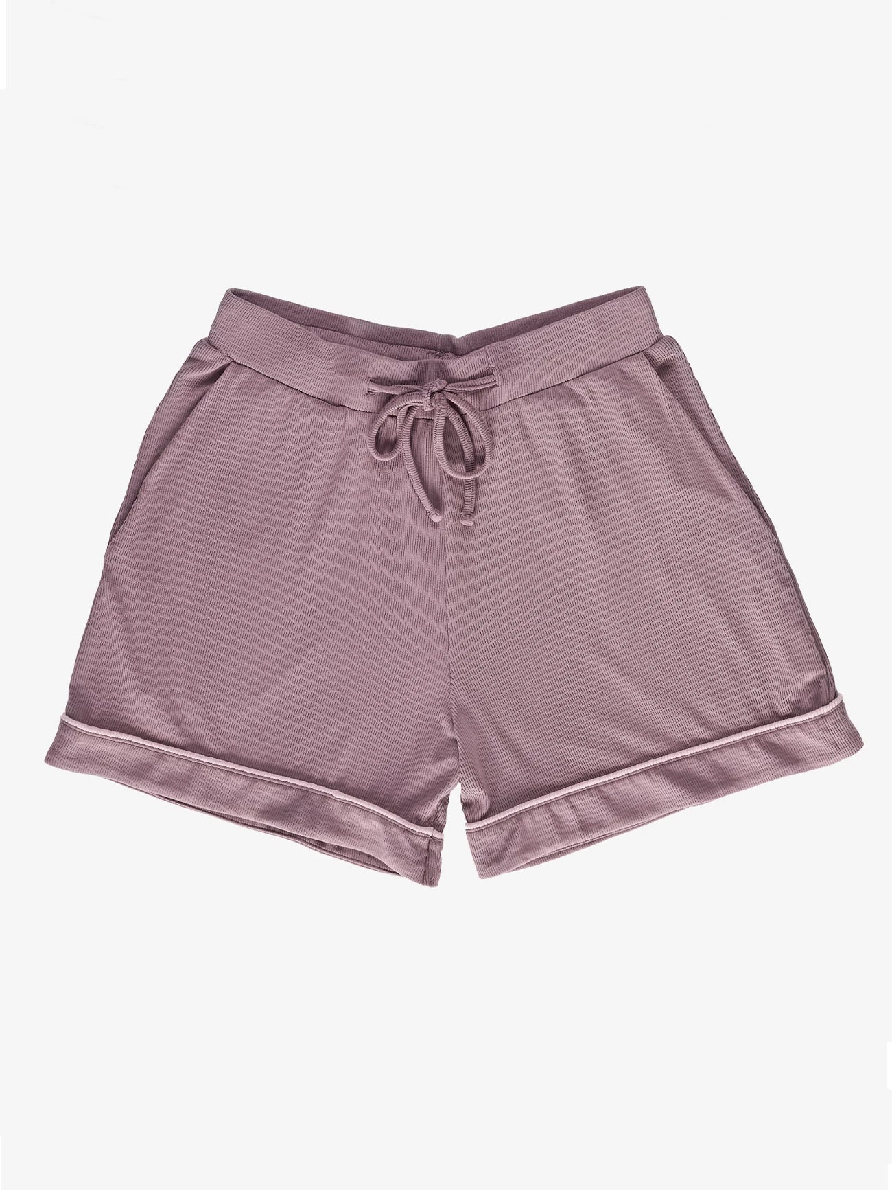 The Women's Rib-Knit Classic Short Sleeve Pajama Set by Cozy Earth includes light purple shorts with a textured fabric and adjustable drawstring waist, featuring side pockets and a slightly rolled hem, shown on a white background. 