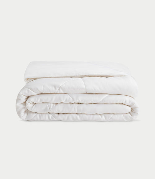 Bamboo Viscose comforter folded up with white background