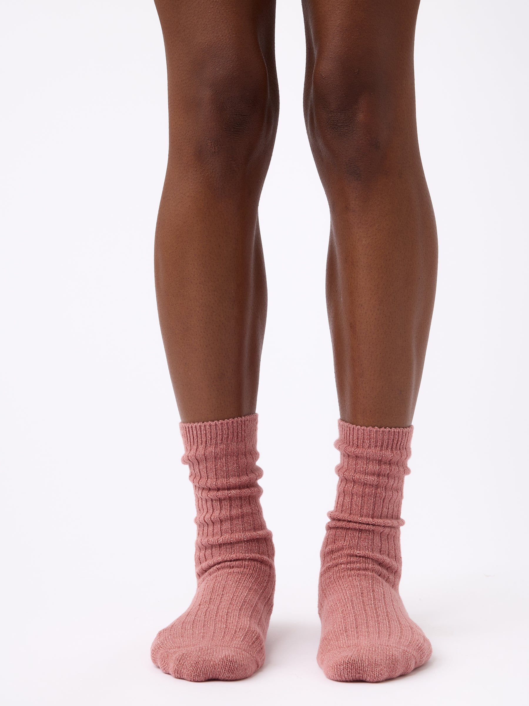 Person wearing Cozy Earth Plush Lounge Calf Sock in Rouge 