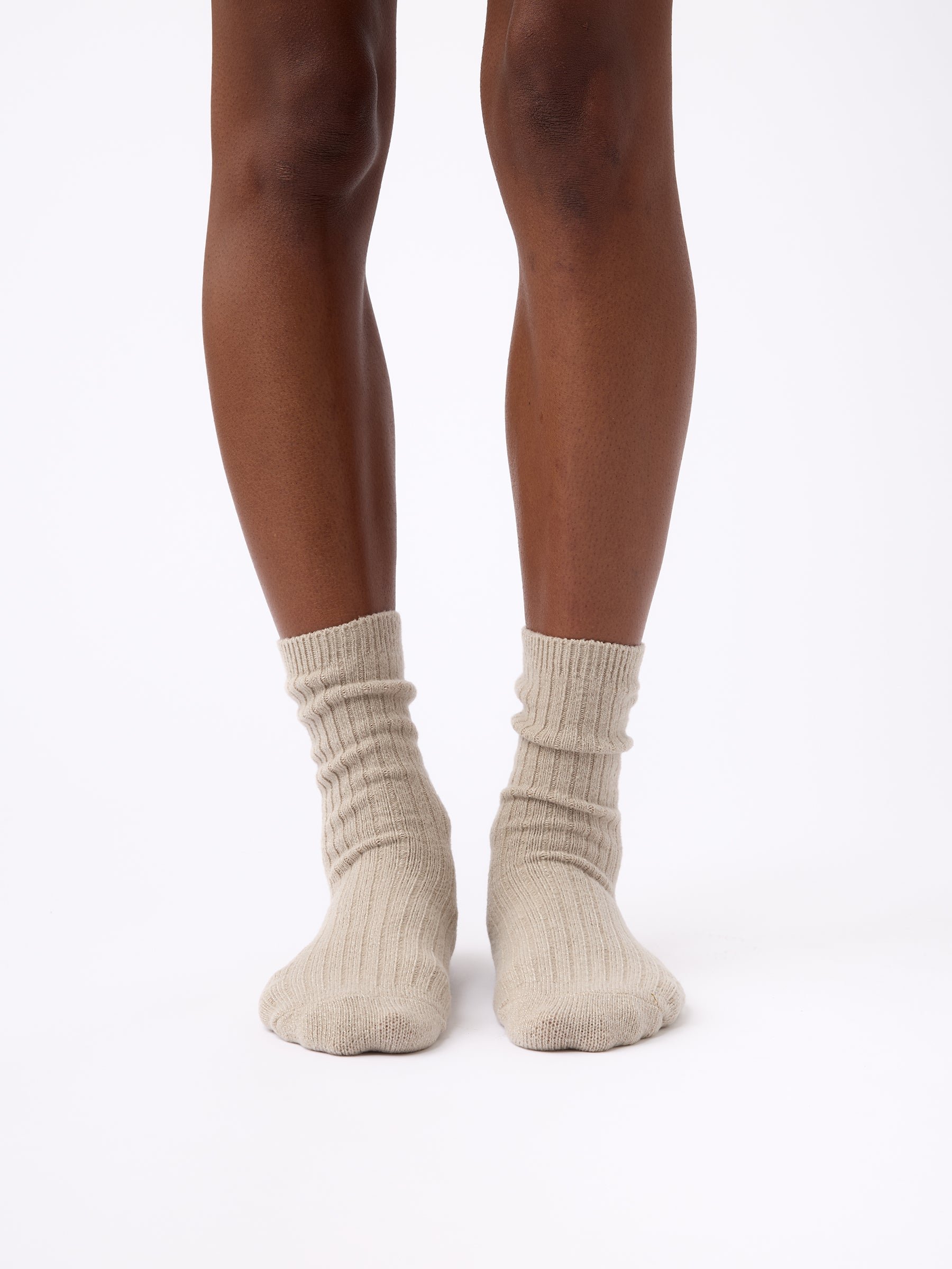 Person wearing Cozy Earth Plush Lounge Sock in Taupe 