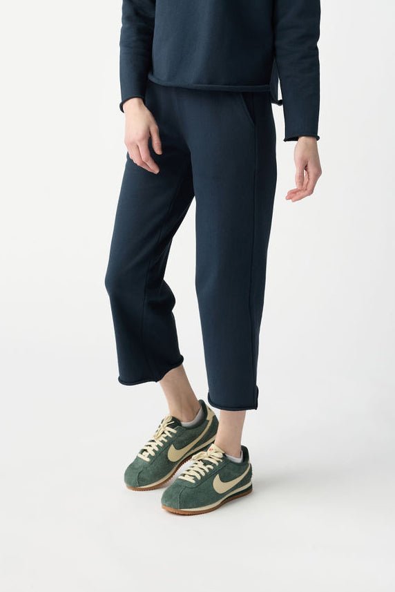 A woman pictured from the waist down wears Cozy Earth Women's Chelsea Cropped Pant in Eclipse in front of a white background. |Color:Eclipse