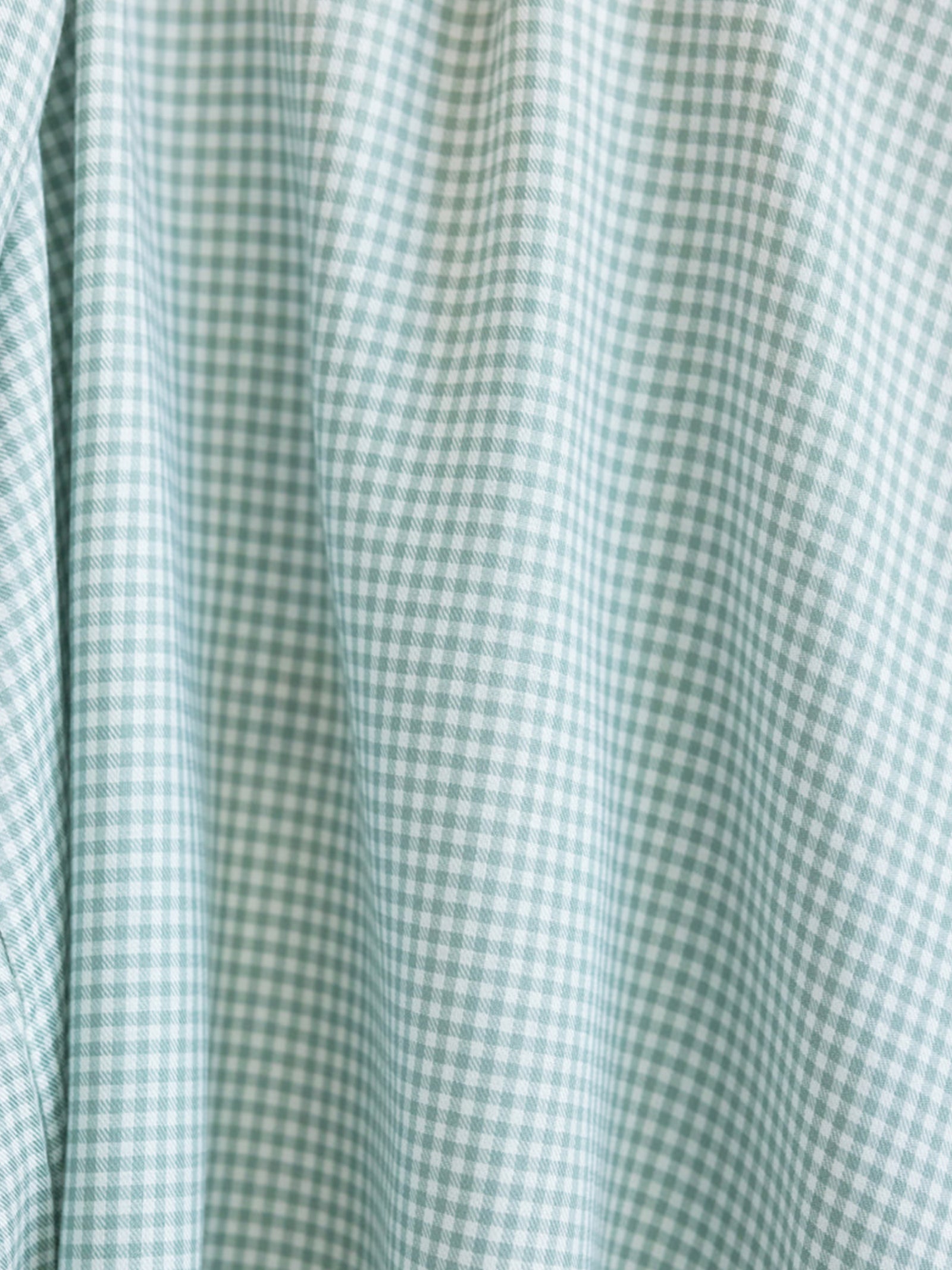Close up of haze mini gingham pajama fabric 