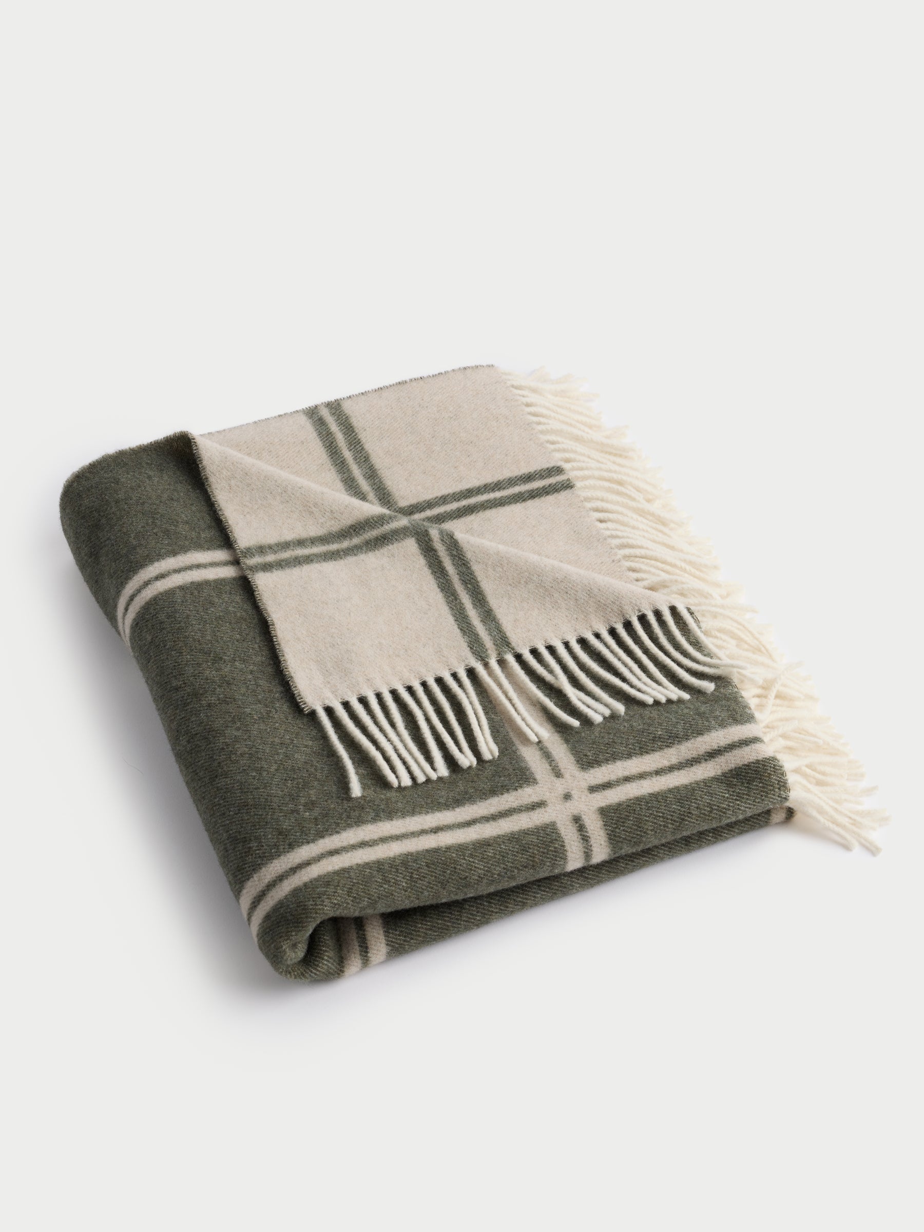 Olive cortina throw folded with white background |Color:Olive/Beige