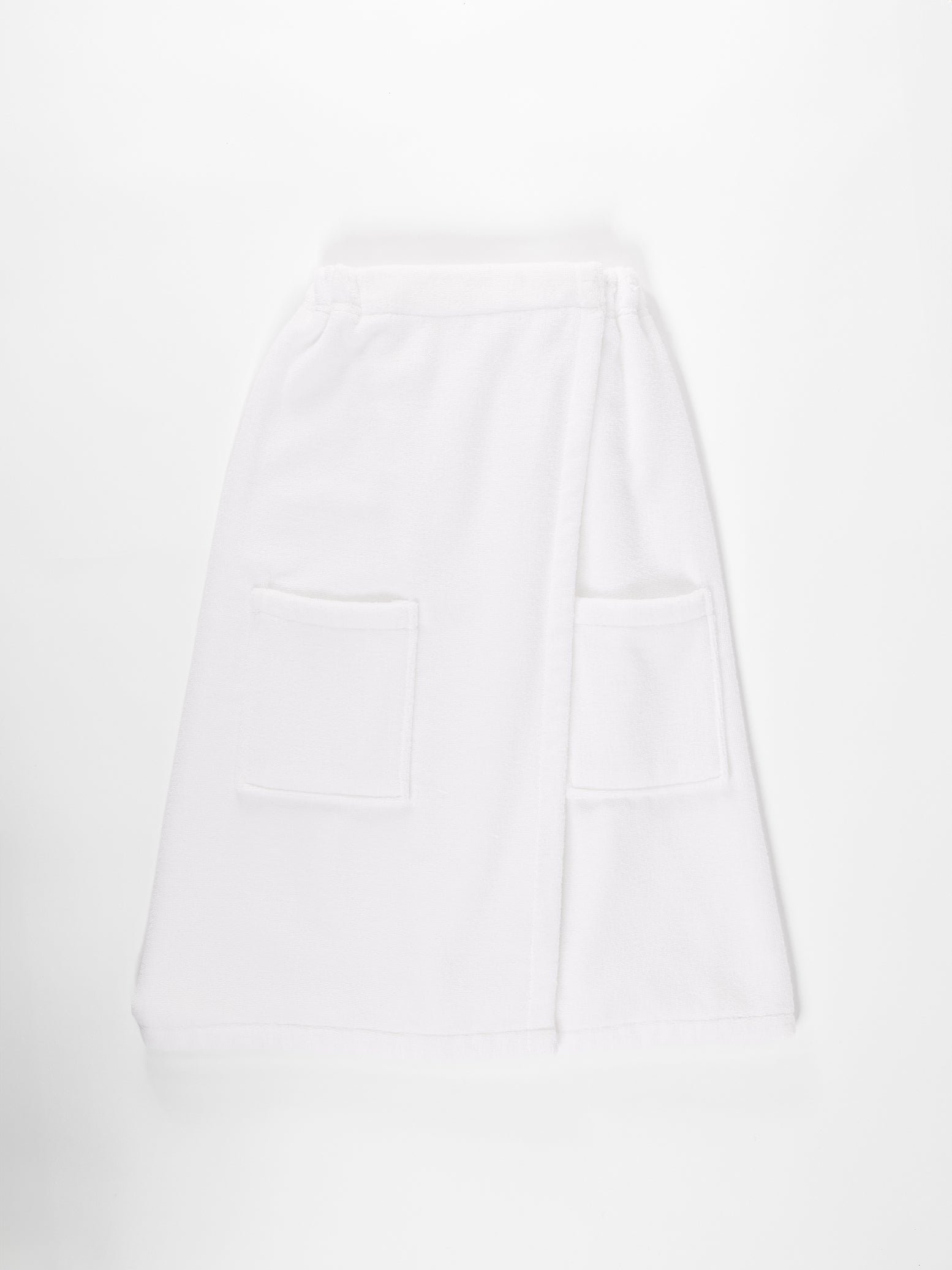 Flat lay of white towel wrap with white background 