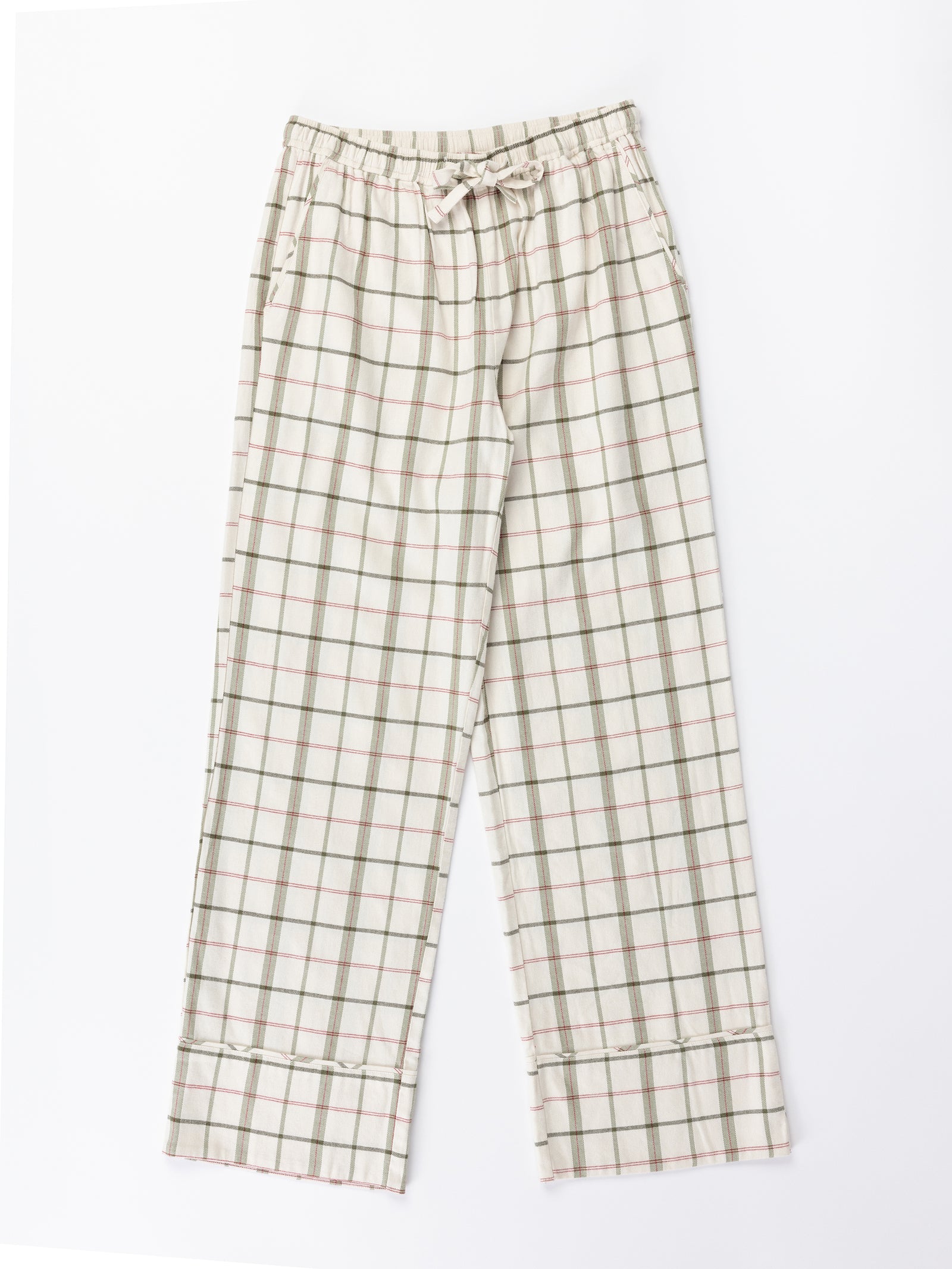 A pair of loose-fitting pajama pants from the Women's Farmhouse Long Sleeve Pajama Set by Cozy Earth, featuring a green and red plaid pattern on a white background. These pants include an elastic waistband with a drawstring, wide legs, and a sewn-up hem at the bottom. They are laid flat on a white background. 