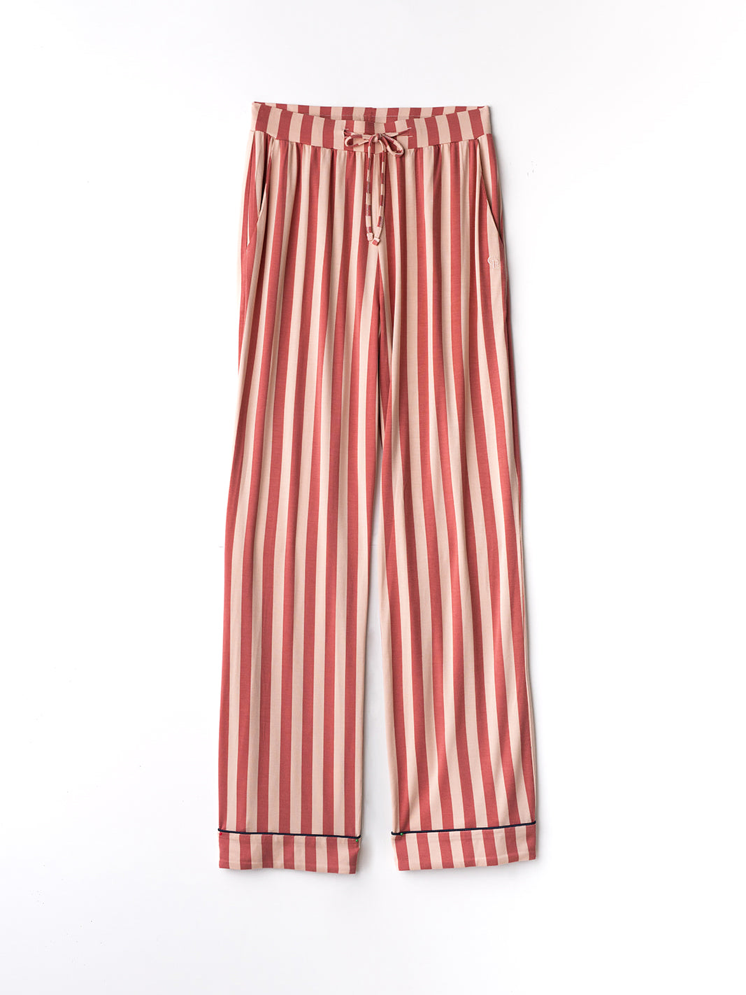 Flat lay of blush stripe pajama pants 