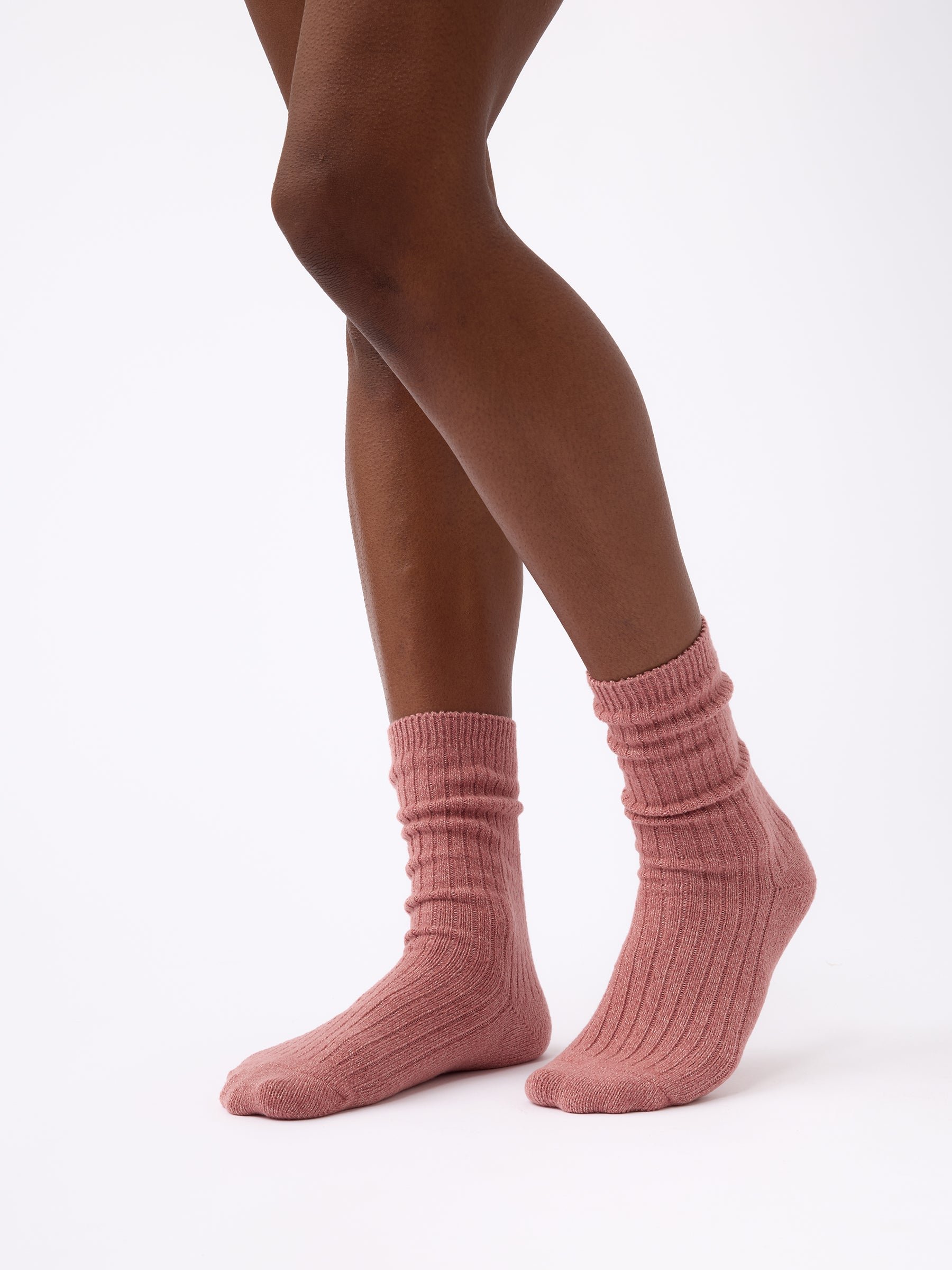 Person wearing Cozy Earth Plush Lounge Sock in Rouge 