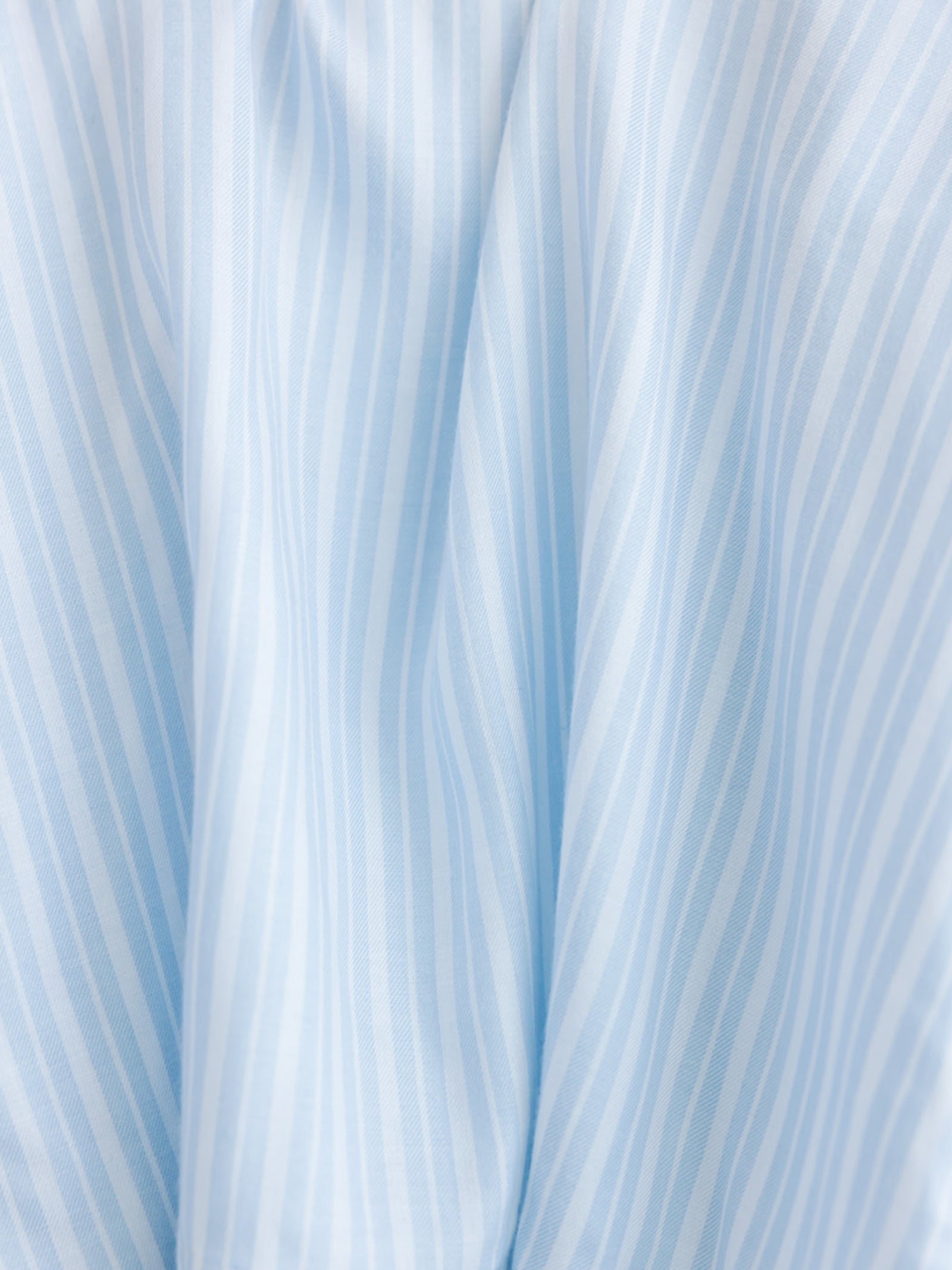 Close up of spring blue stripe pajama fabric 