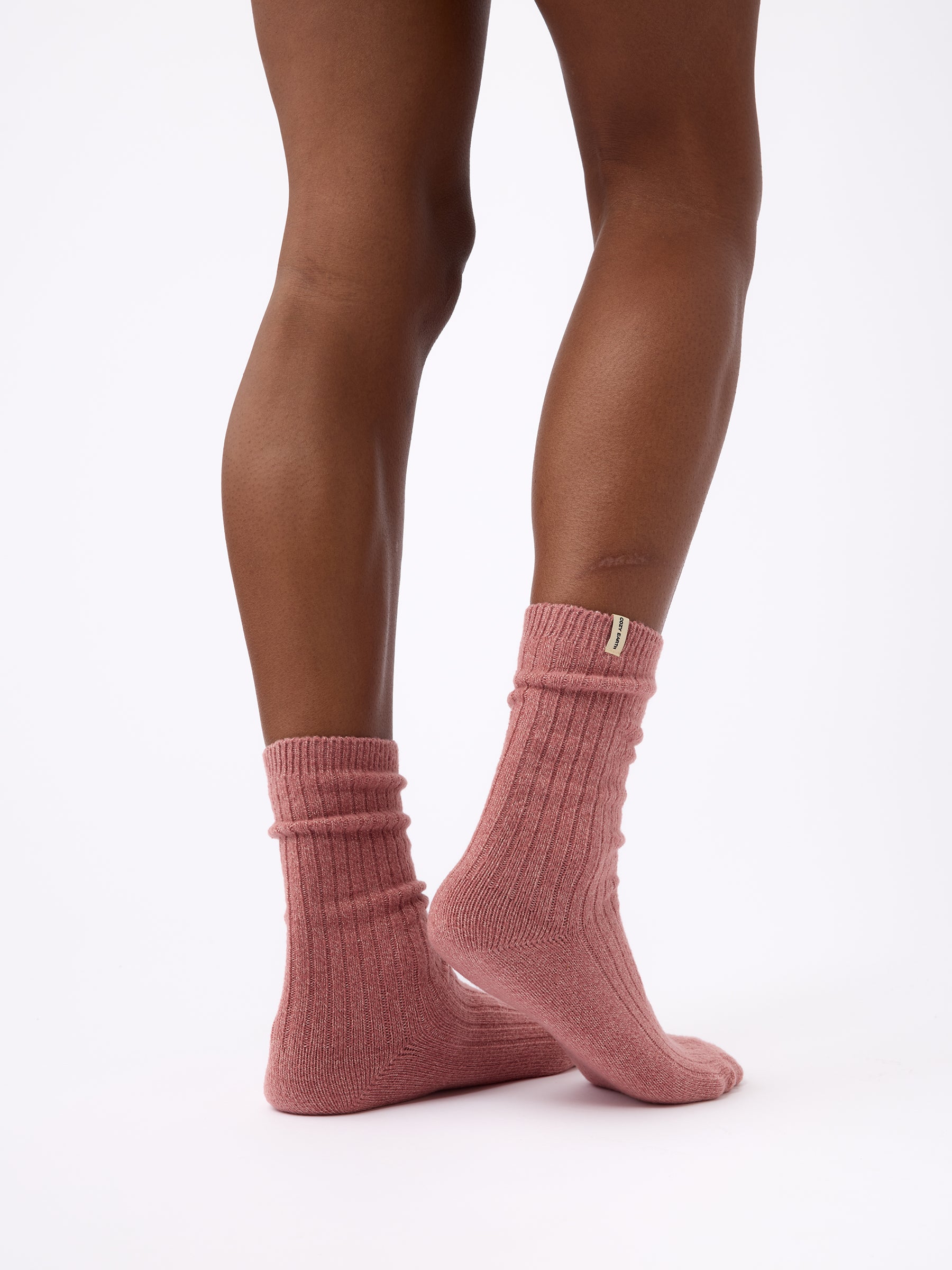 Person wearing Cozy Earth Plush Lounge Calf Sock in Rouge 