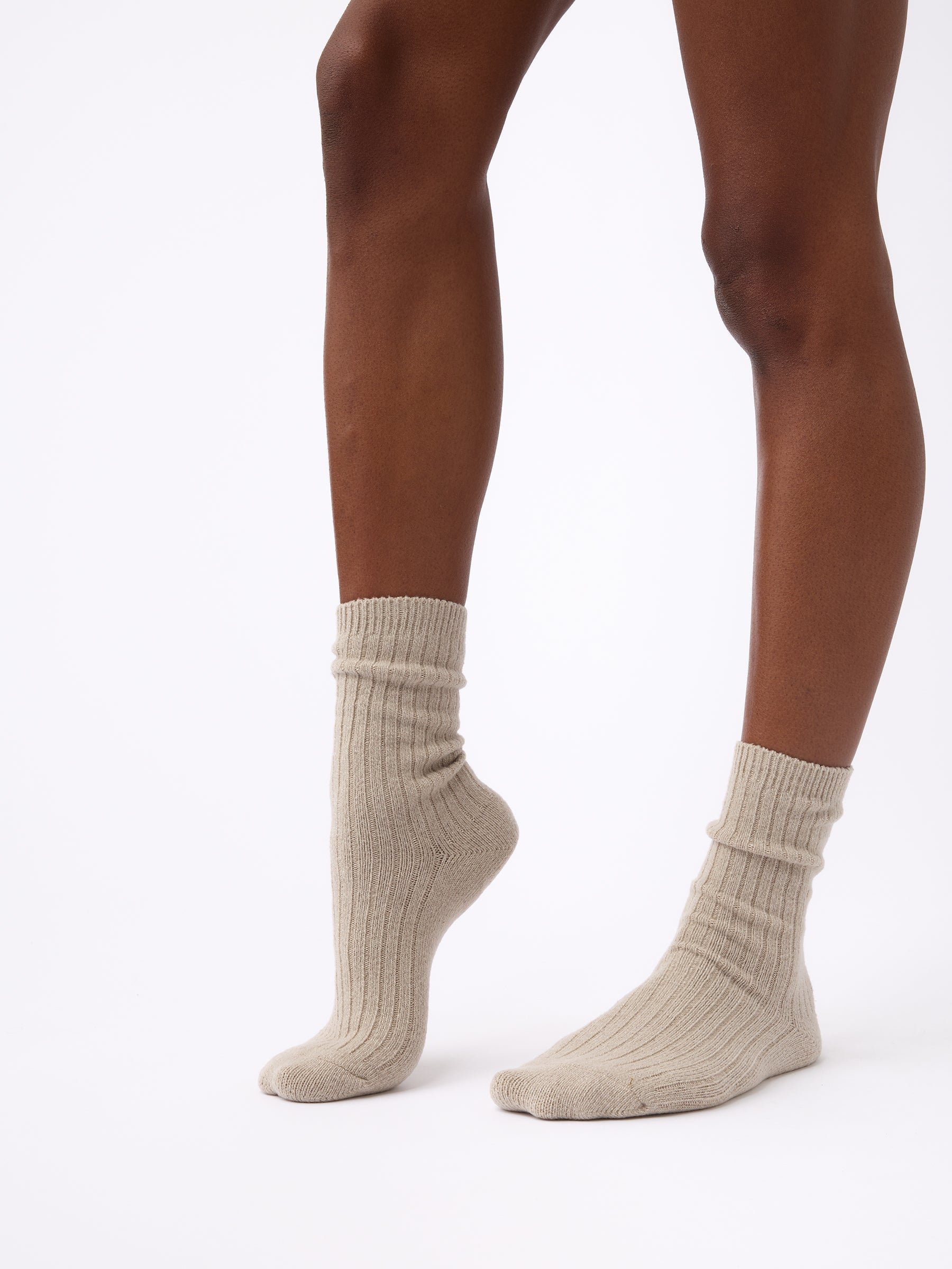 Person wearing Cozy Earth Plush Lounge Sock in Taupe 