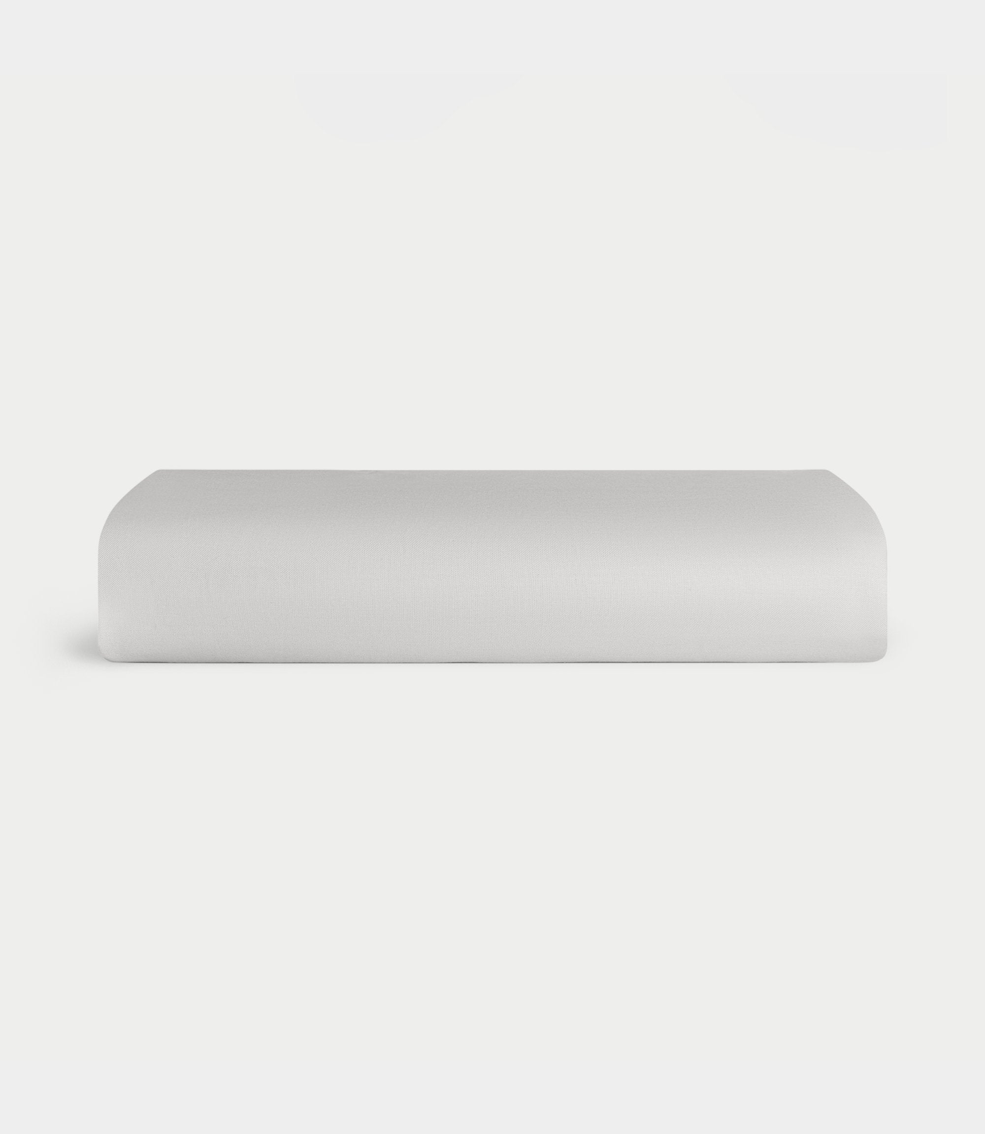 Light Grey Bamboo Linen Fitted Sheet Folded over a white background. |Color: Light Grey