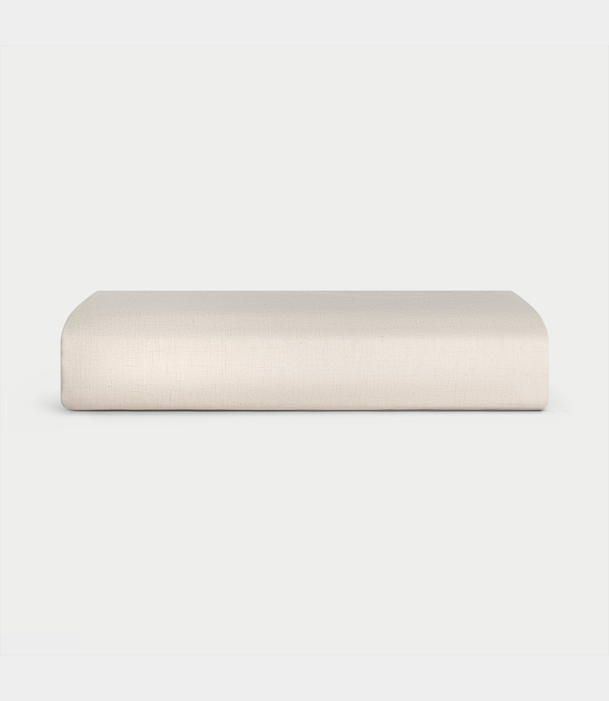 Natural Bamboo Linen Fitted Sheet Folded over a white background. |Color: Natural