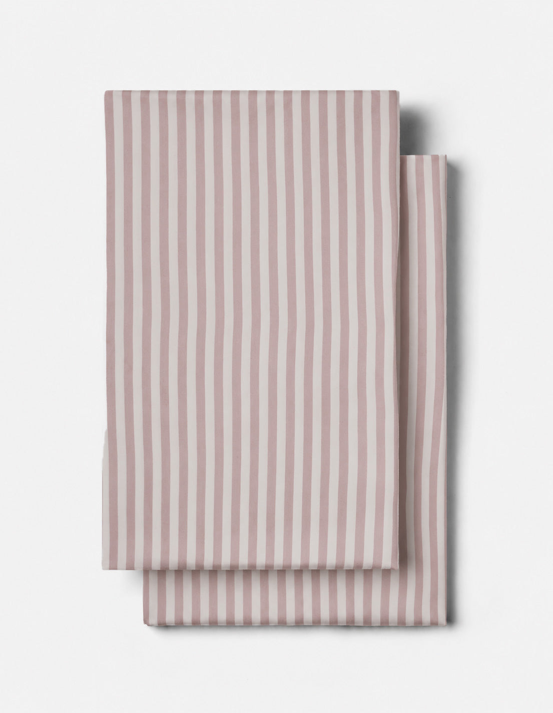 Two neatly folded striped lavender Cozy Earth Bamboo Pillowcases are stacked on a plain, light background.
