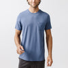 Blue Men's Stretch-Knit Bamboo Lounge Tee. A man is wearing the lounge tee in a well lit home.|Color:Blue
