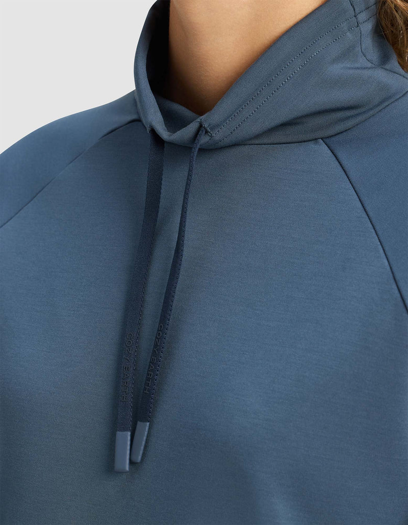 Close-up of a person wearing the Cozy Earth Women's Brushed Bamboo Mock Neck, featuring a high collar with two drawstrings. The smooth, slightly stretchy fabric adds comfort and style, shown from shoulders to lower neck.