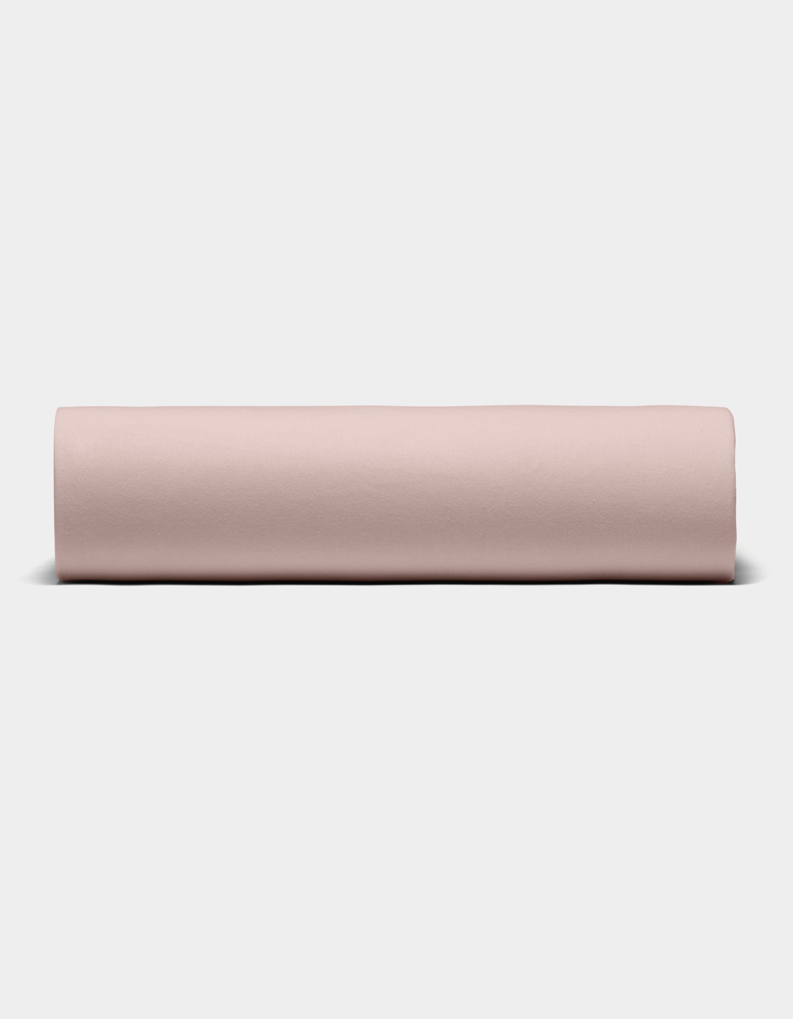 The Cozy Earth Bamboo Jersey Sheet Set is shown rolled into a neat cylinder, displayed from the front against a plain white background.