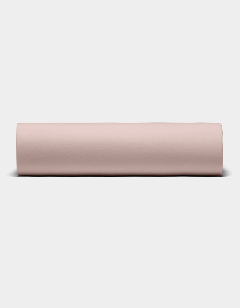 The Cozy Earth Bamboo Jersey Sheet Set is shown rolled into a neat cylinder, displayed from the front against a plain white background.