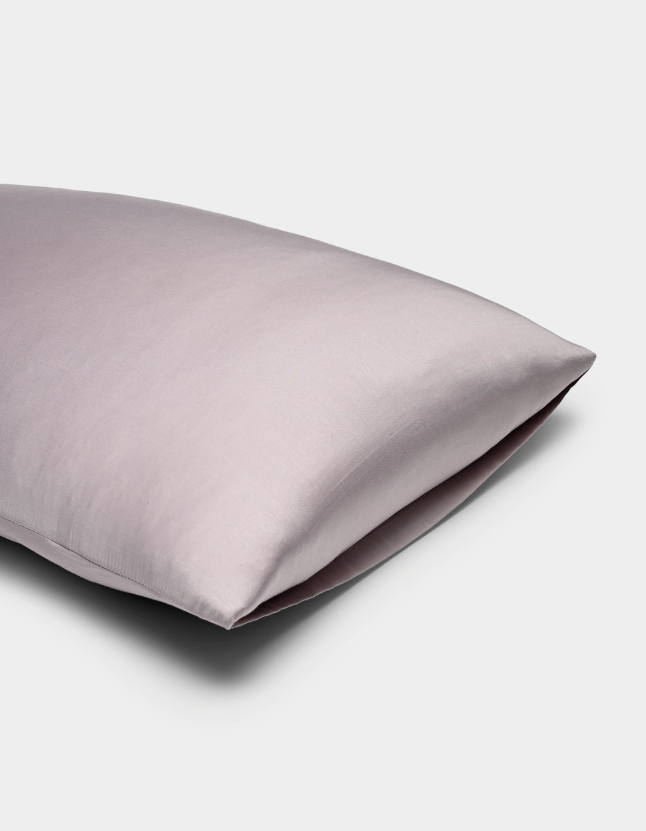 A light purple Cozy Earth Bamboo Pillowcase with a smooth, soft fabric cover, shown on a white background.