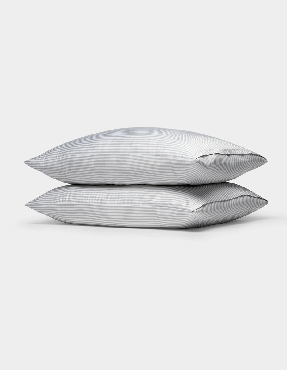 Two Cozy Earth Bamboo Pillowcases stacked on top of each other against a plain white background.