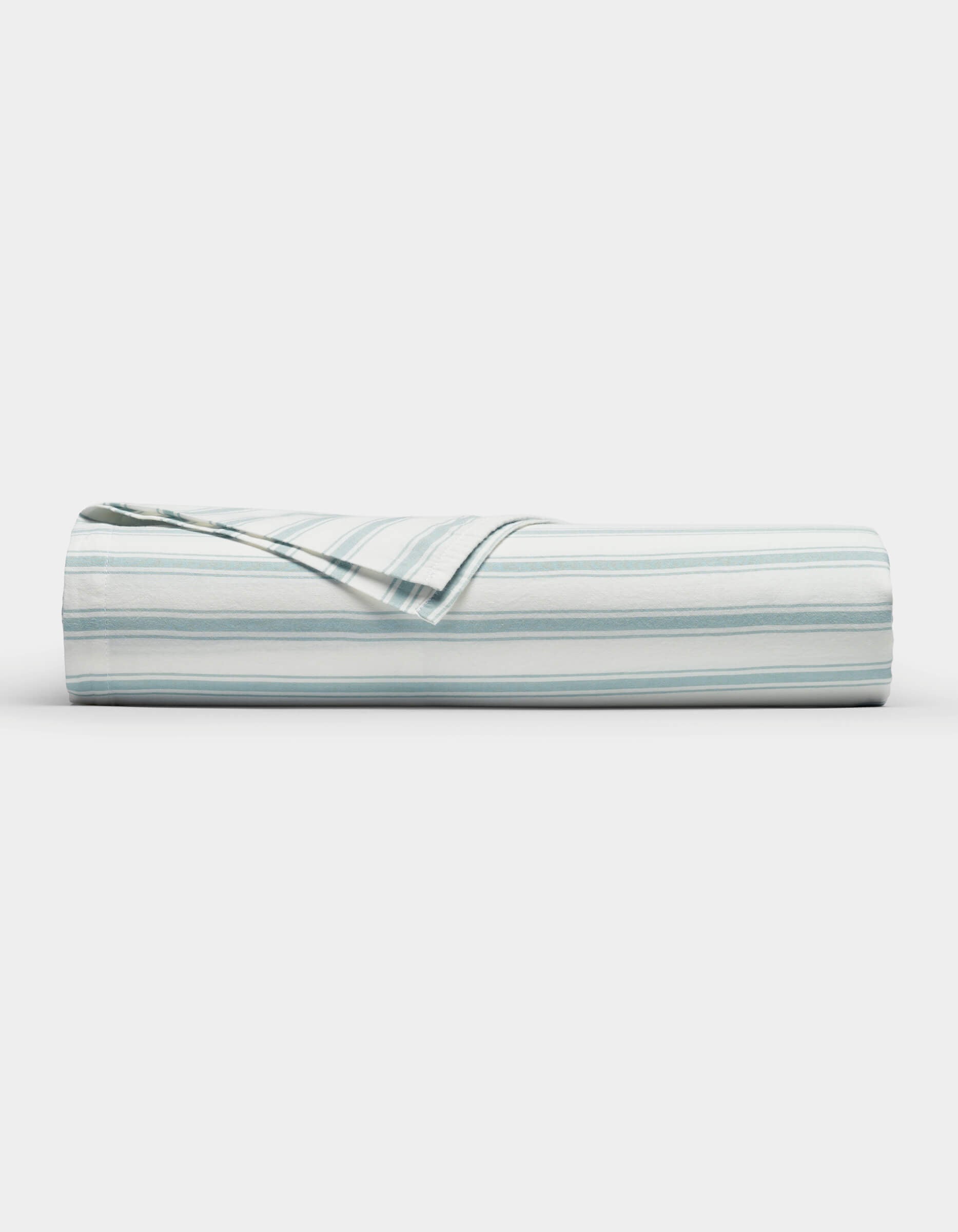 The Cozy Earth Soft-Wash Cotton Flat Sheet, featuring light blue and white horizontal stripes, is neatly folded and displayed against a plain white background.