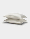 Two Cozy Earth Bamboo Quilted Shams in white, stacked on top of each other against a plain white background.|Color:Sonoma Floral in Vintage White