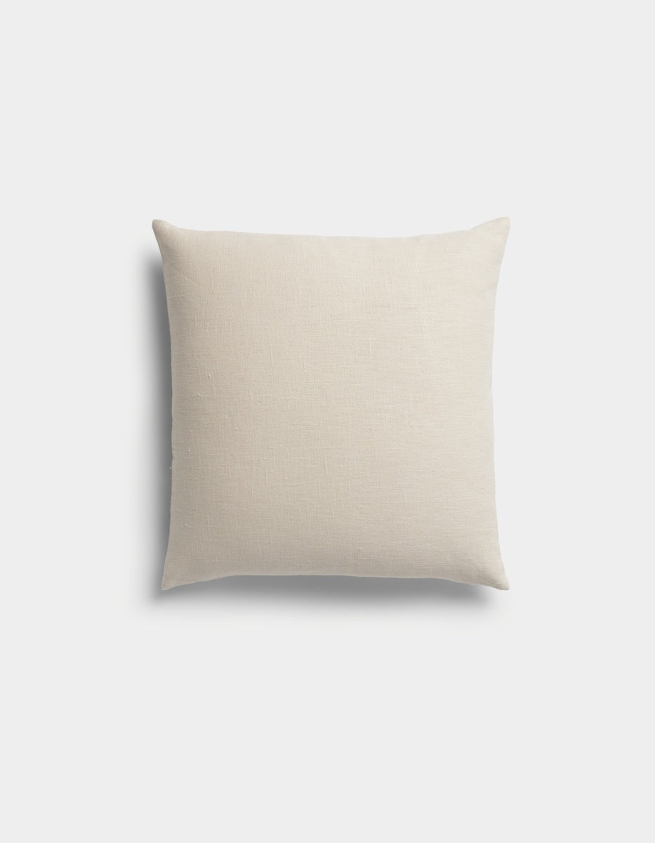 The Sonoma Throw Pillow by Cozy Earth, featuring a plain, light beige square design, is displayed against a white background.|Color:Canvas|Size:20" x 20"