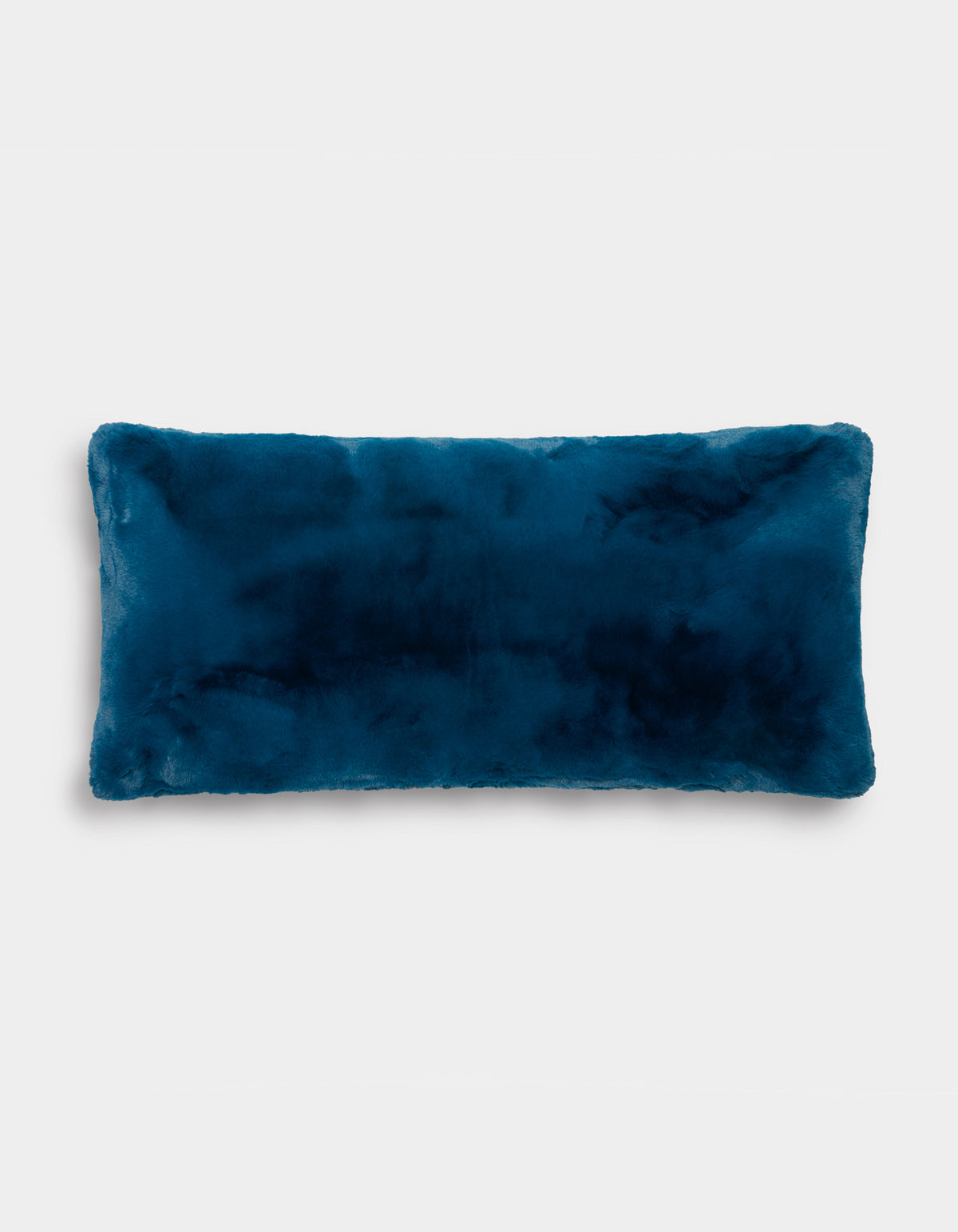 The Cozy Earth Superplush Cuddle Pillow, featuring a soft, velvety dark blue cover, is displayed against a plain light background.