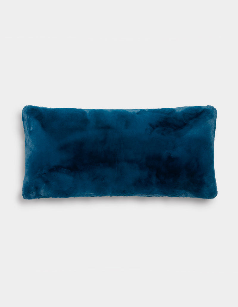 The Cozy Earth Superplush Cuddle Pillow, featuring a soft, velvety dark blue cover, is displayed against a plain light background.