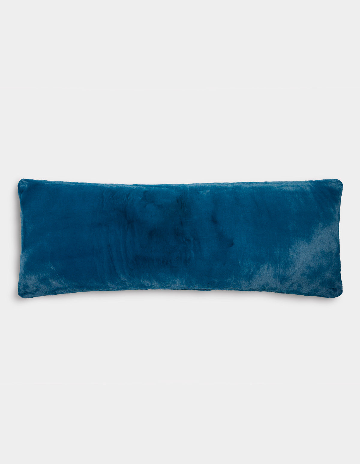 The Cozy Earth Superplush Cuddle Pillow is a rectangular pillow in dark teal, featuring a luxuriously soft, velvety texture, and is displayed against a plain white background.