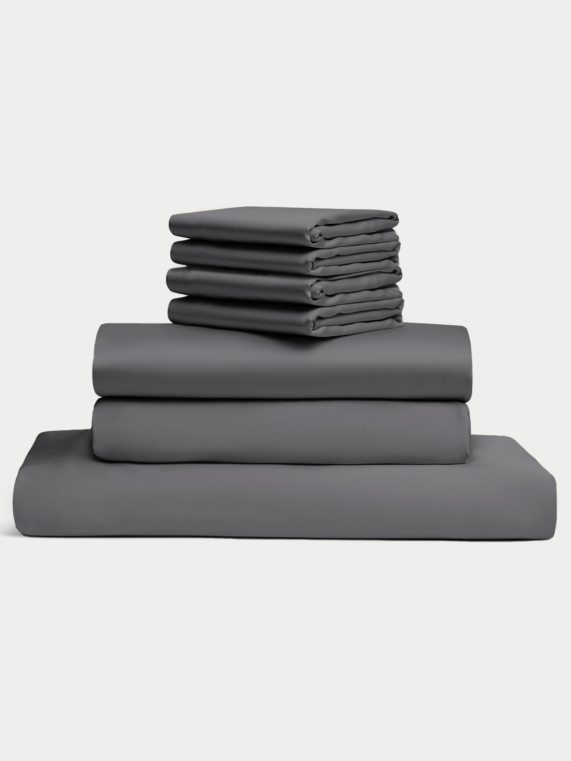 Charcoal bedding bundle stacked up with white background 
