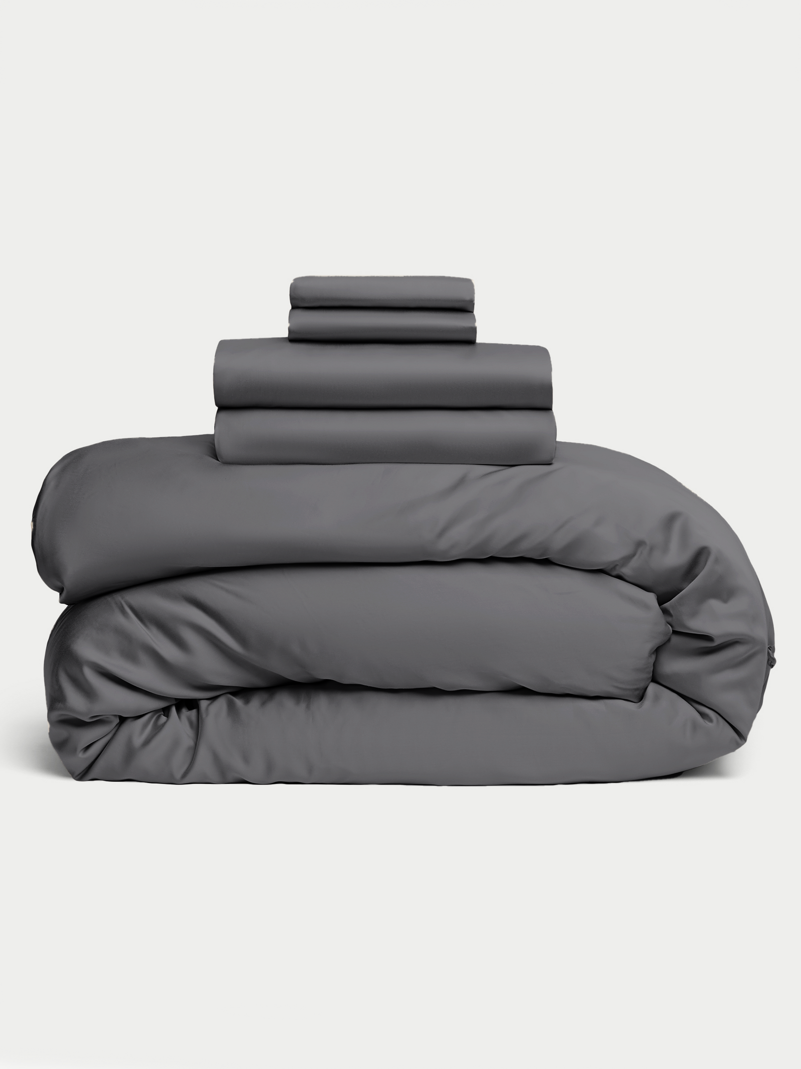 Charcoal bedding bundle stacked up with white background 