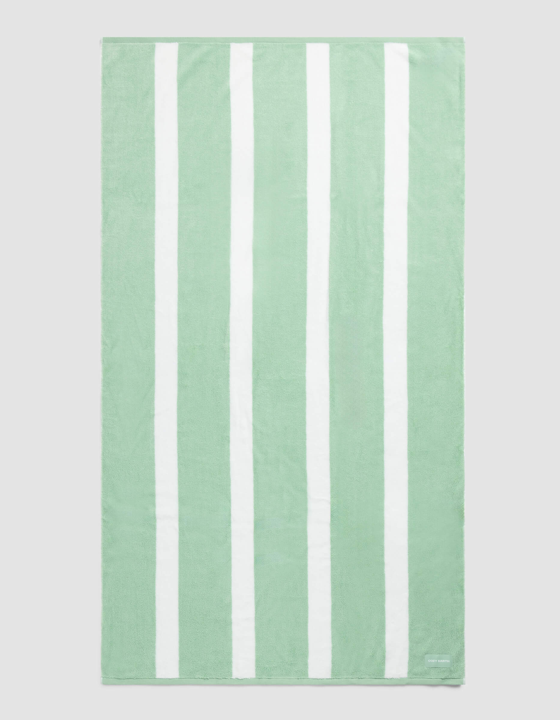 The Cozy Earth Classic Stripe Resort Towel in Julep features wide, evenly spaced light green and white vertical stripes and is displayed laid flat against a plain background.|Color:Julep