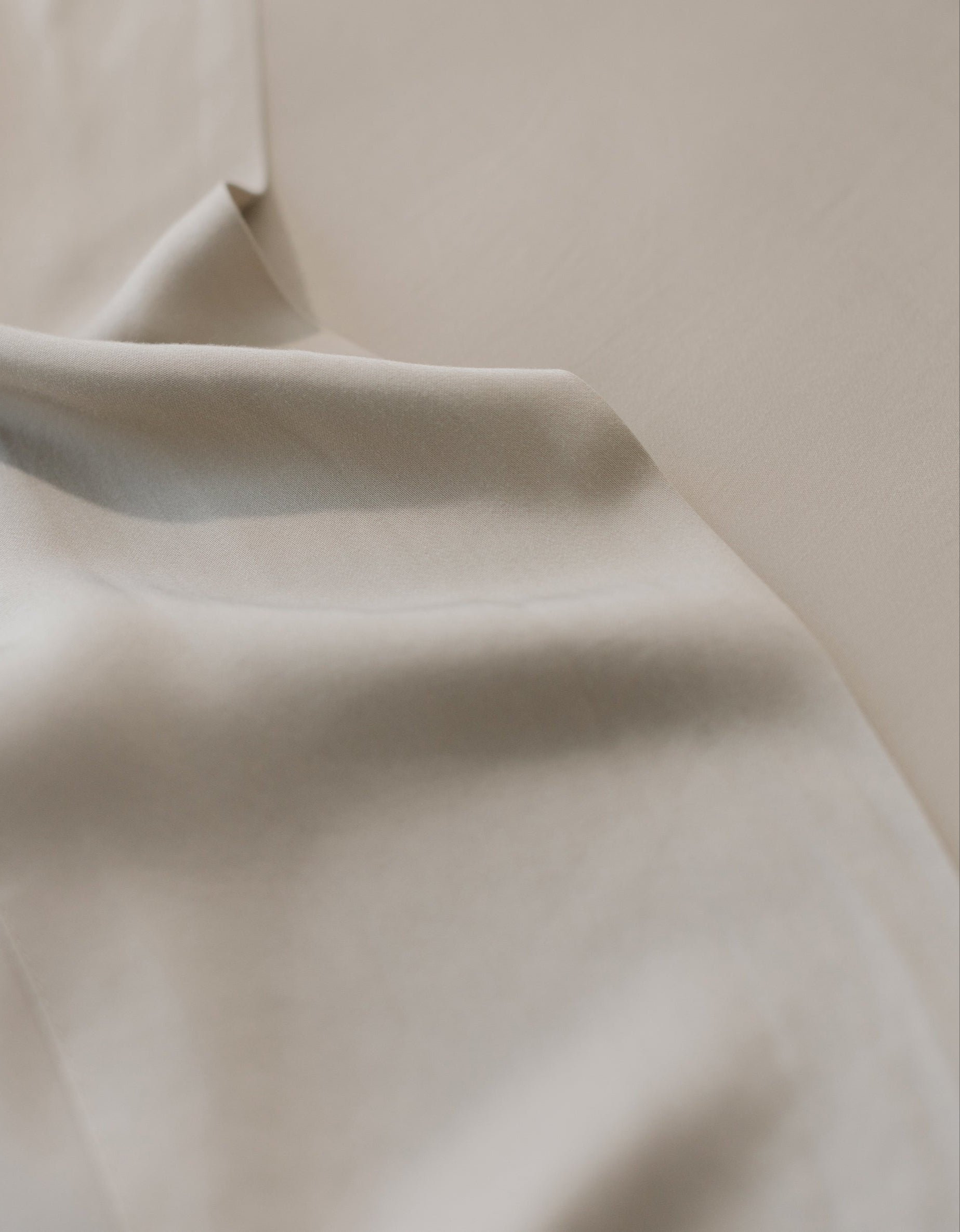 Close up of driftwood bedding fabric 